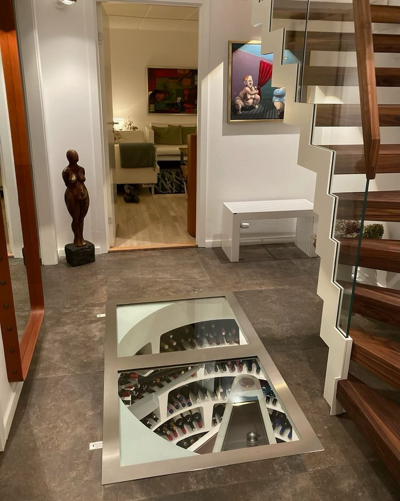 Is your wine collection too big for a wine fridge?

In this project the family wanted to remodel their hallway and include a wine cellar for a minimum of 1.000 bottles of wine, champagne or liquor. 

If you are planing on doing the same in your home 