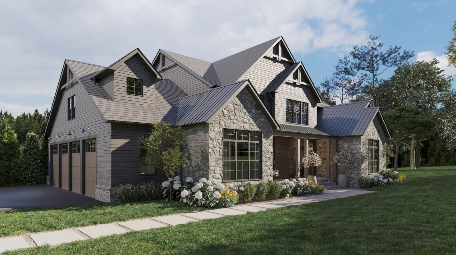 A large, modern house with a stone and gray siding exterior, multiple gabled roofs, and large windows, surrounded by a manicured lawn with flower beds and trees.