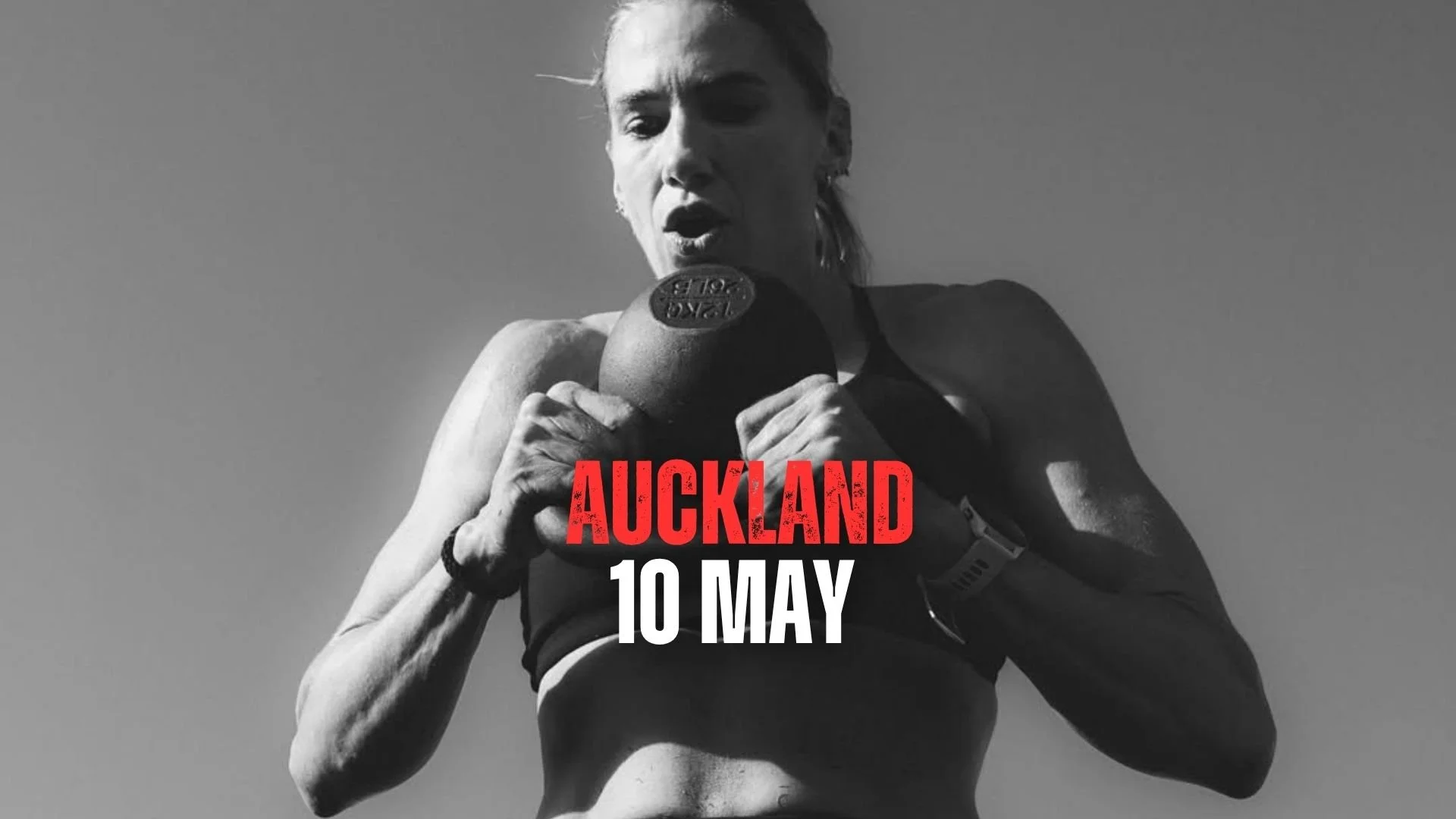 Female athlete lifting kettlebell at deadly dozen oceania champs