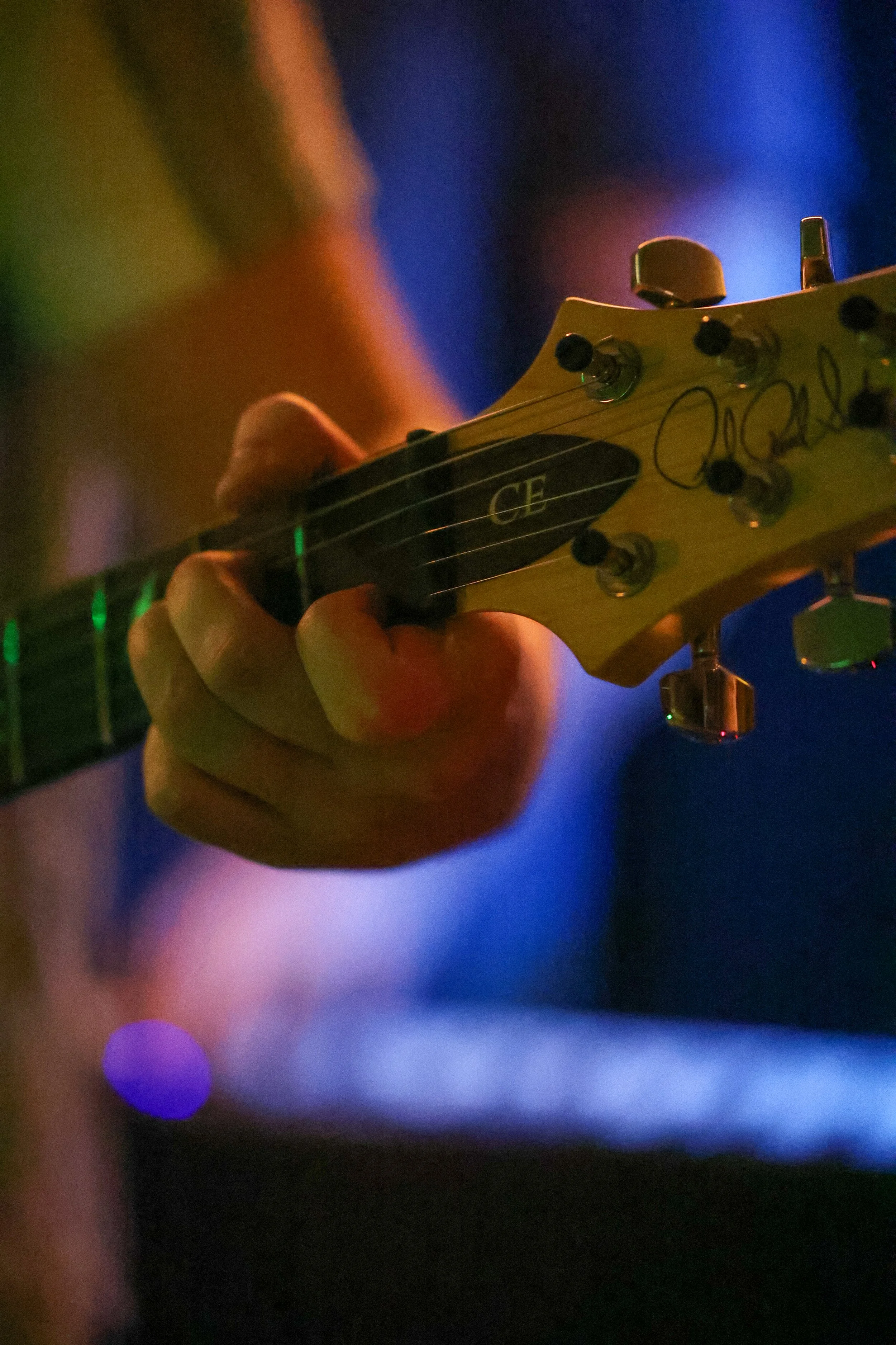 Owen Hale fingers the tabs on his guitar during a live performance. (Luke Kaiser)