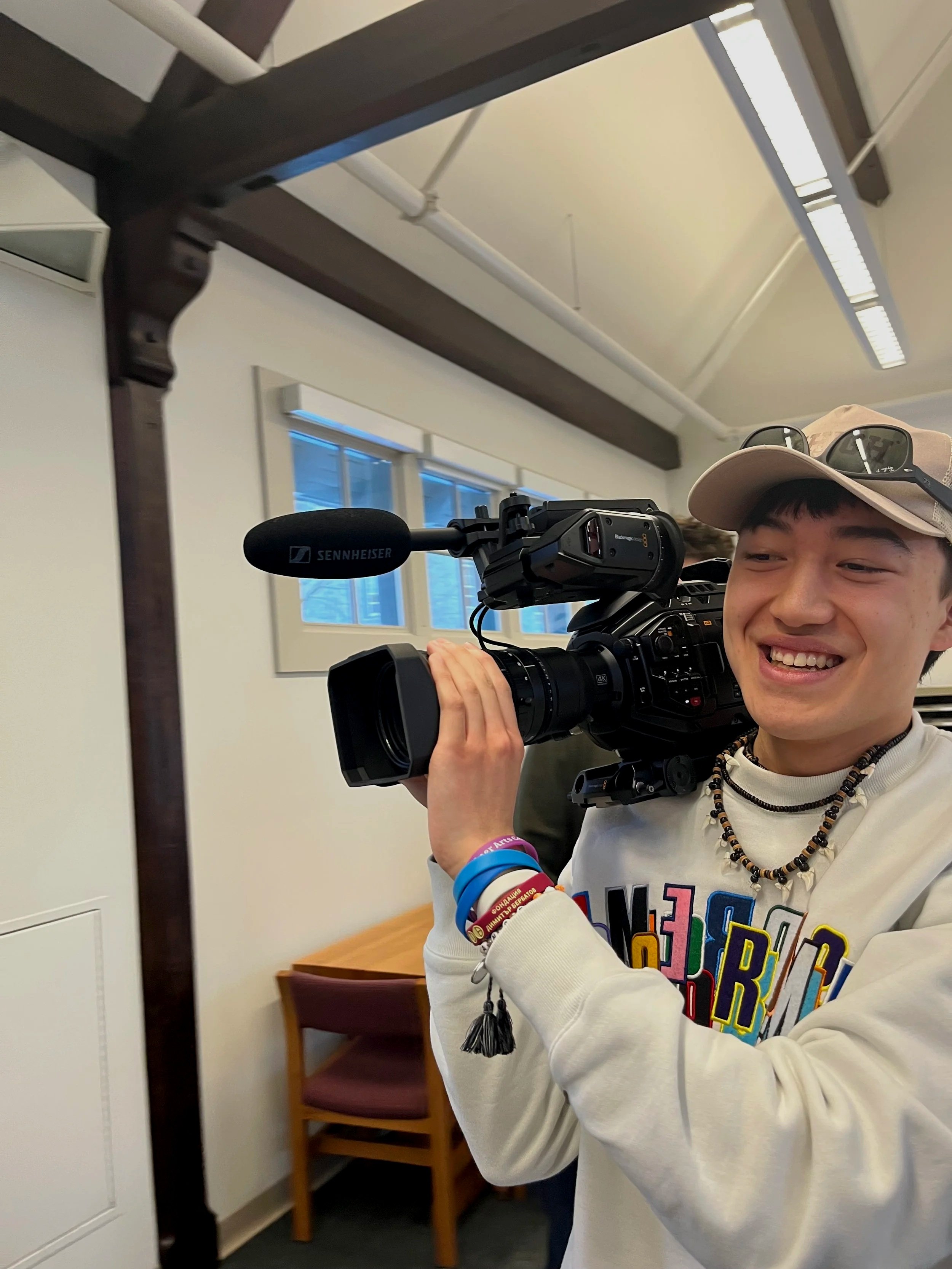 Luke Kaiser holds a video camera
