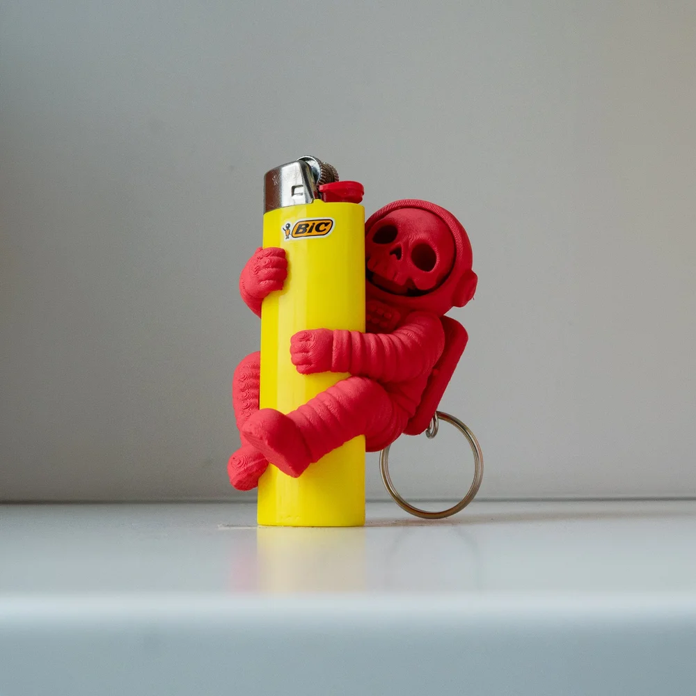 3D printed skeleton astronaut lighter holder