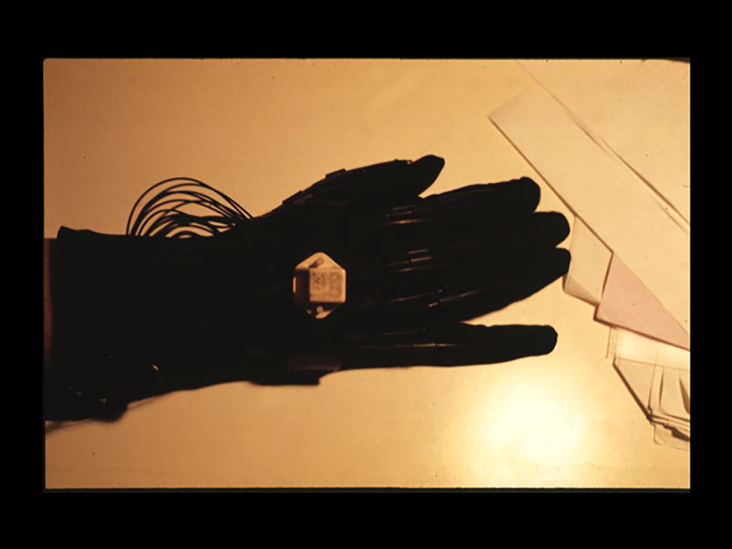 Wearing the glove, your movements are recorded as pages of data.