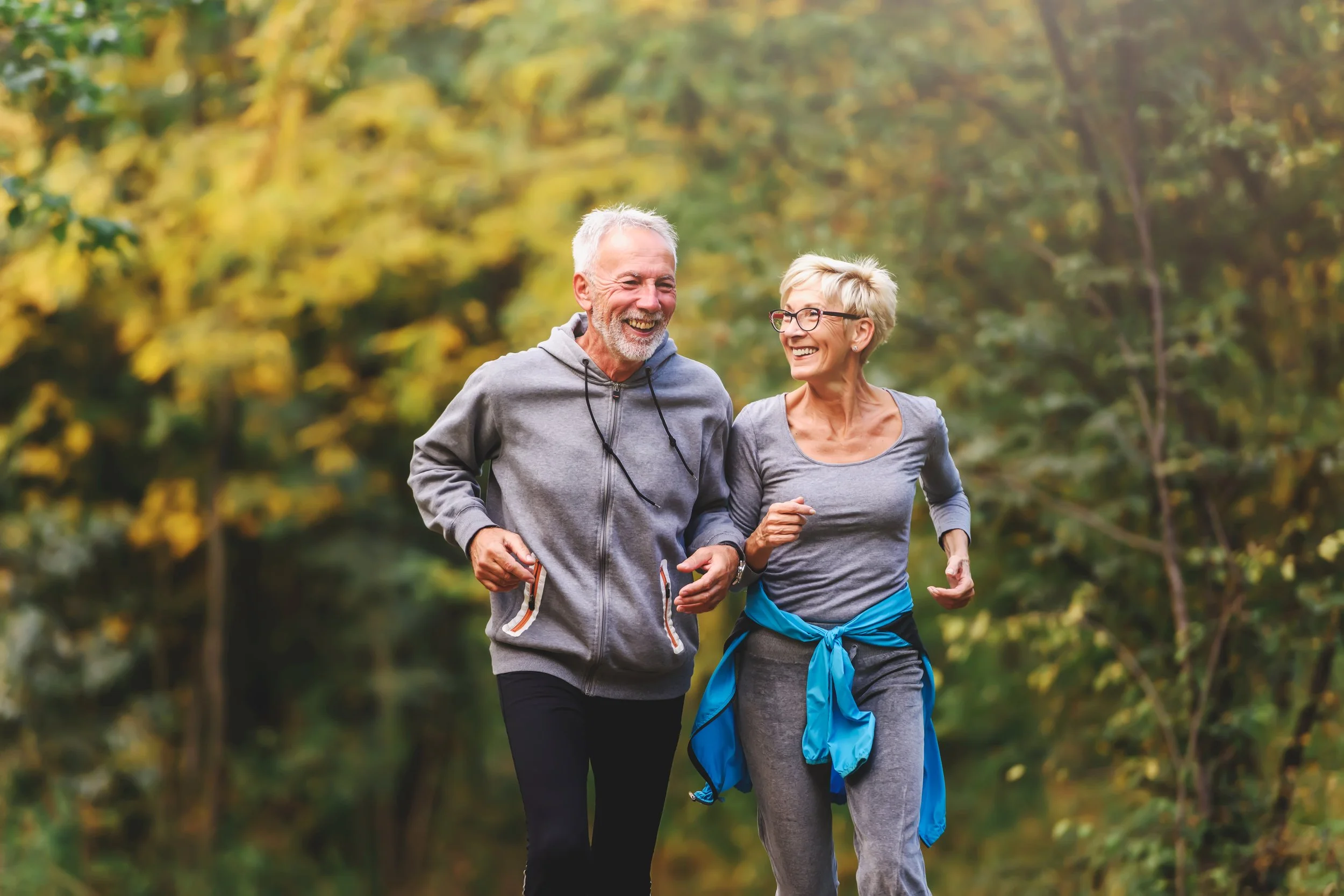 couple running after man discovers the low cost of TRT in Ithaca NY