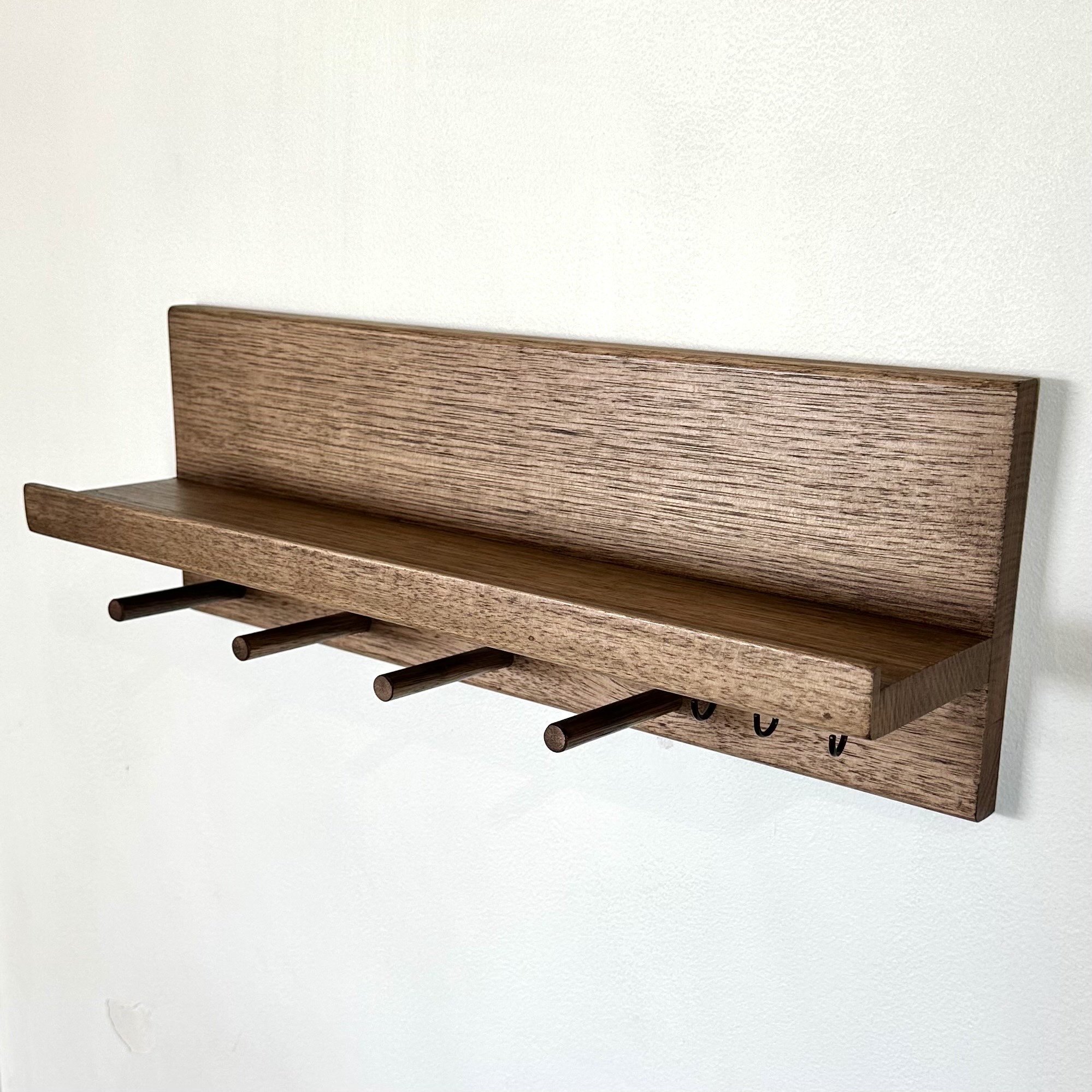 Walnut Stained Oak Organiser with shelf, dowel pegs and key hooks for sleek storage.