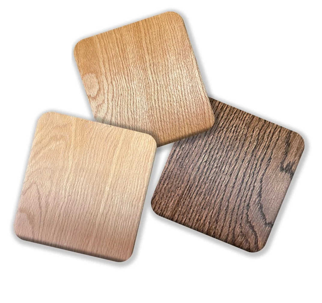 Three square wooden samples with different wood grain and color.