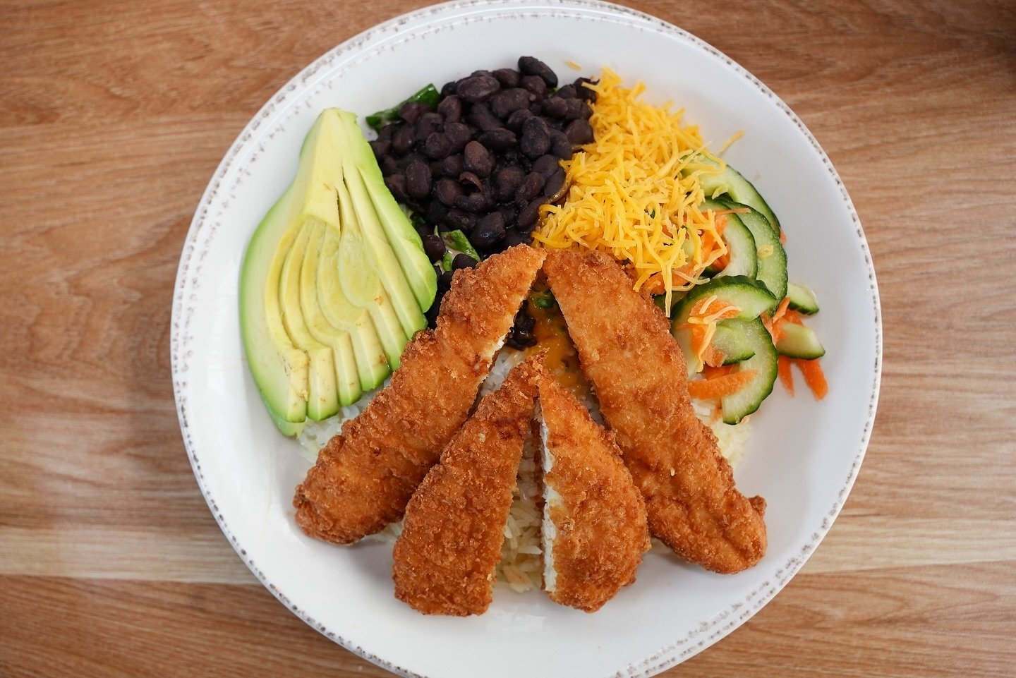 Golden chicken tenders, ripe avocado slices, hearty black beans, and a crisp salad mix for a delicious meal. 

#FreshEats #gardena #southbay #familyownedbusiness #delicious