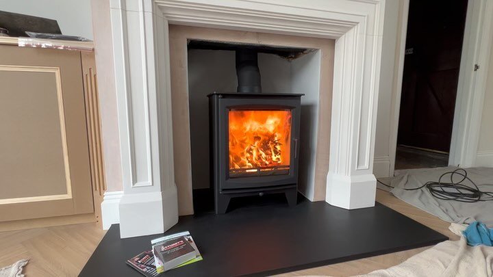 A complete re fit. 

We can&rsquo;t take credit for the stunning new surround but removing the old surround , re sizing the opening and refitting the clients new stove has been a very enjoyable job. 

The room has had a complete stunning  make over a