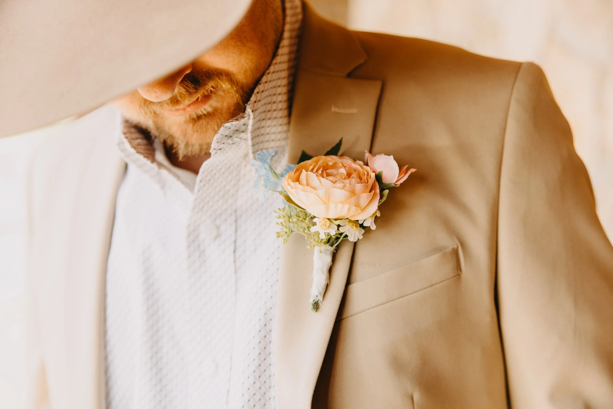 colorful boutonniere with artificial flowers