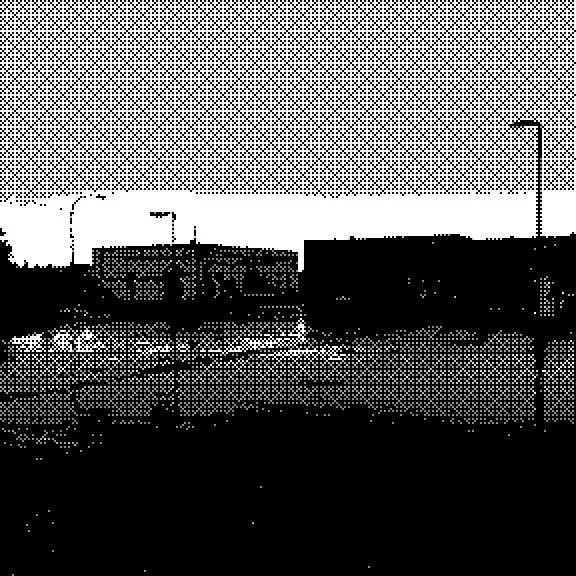 Industrial parking lot after the rain, black and white photo