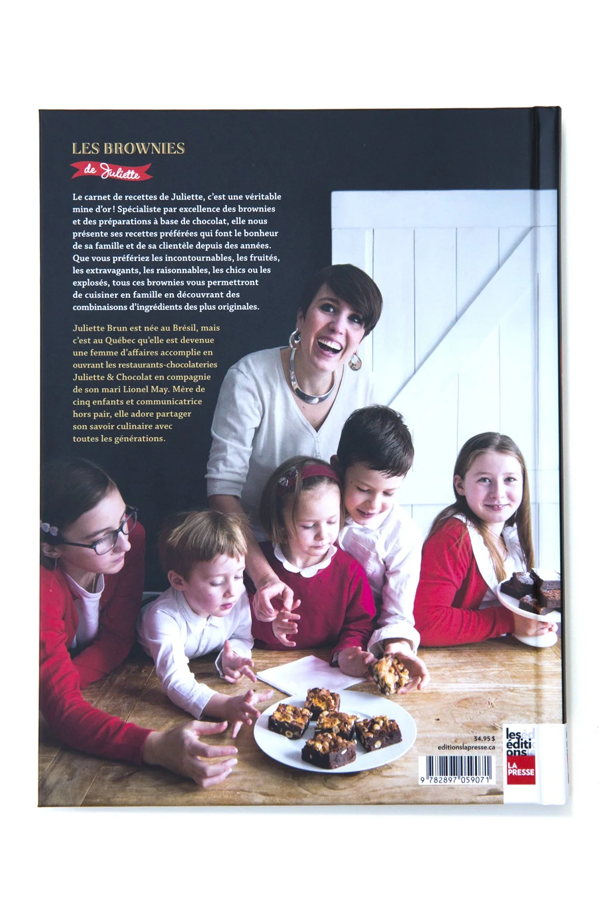 Back cover of brownie cookbook, showing the author, Juliette, enjoying brownies.
