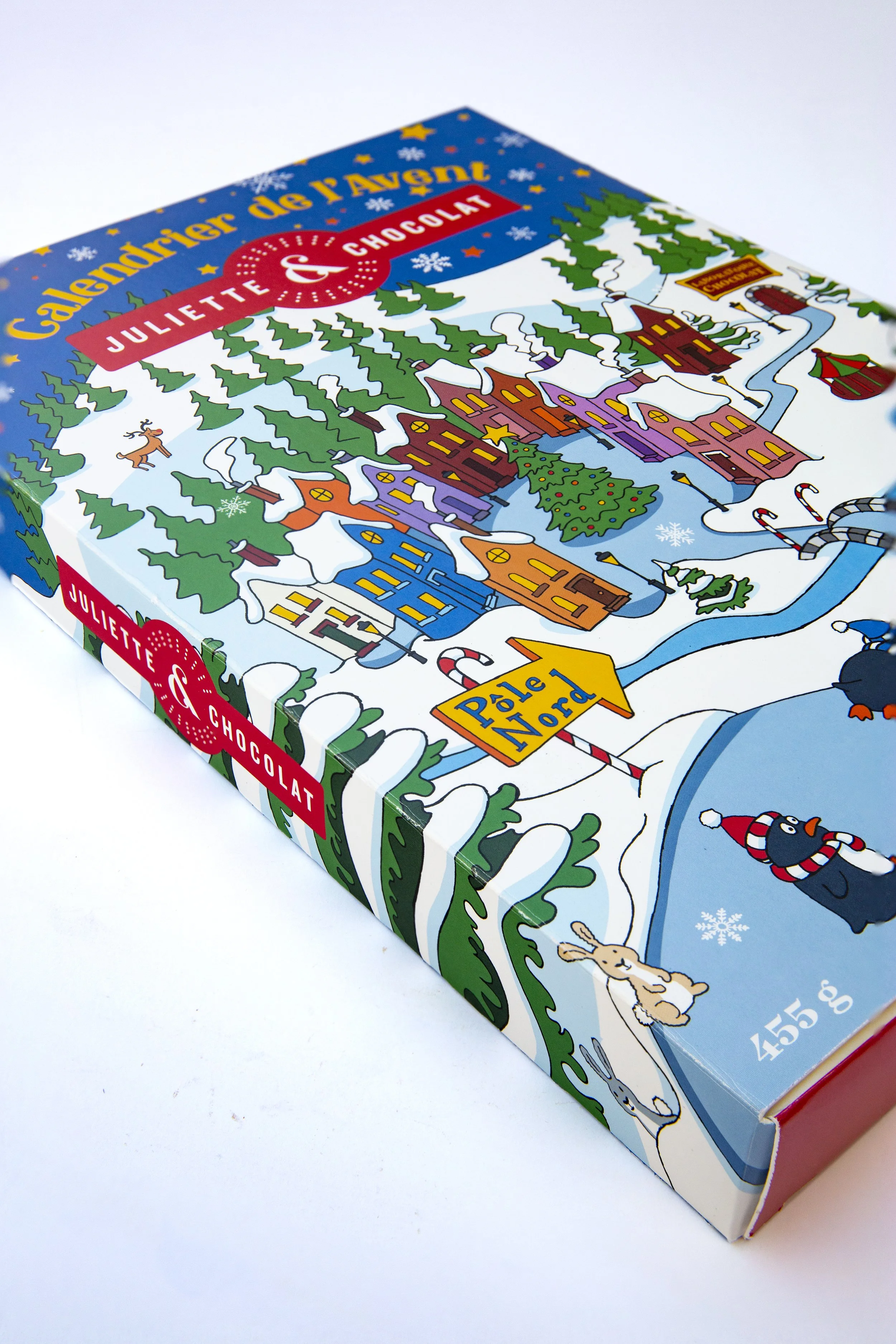 Advent Calendar box full of chocolate and a cute Christmas scene. 