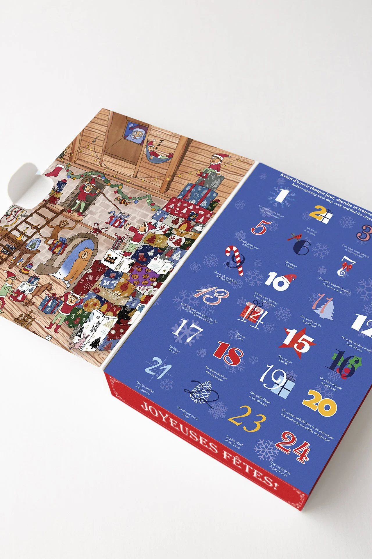 Beautiful open Advent Calendar from Juliette & Chocolat showing the 24 doors, one for each day of December. 