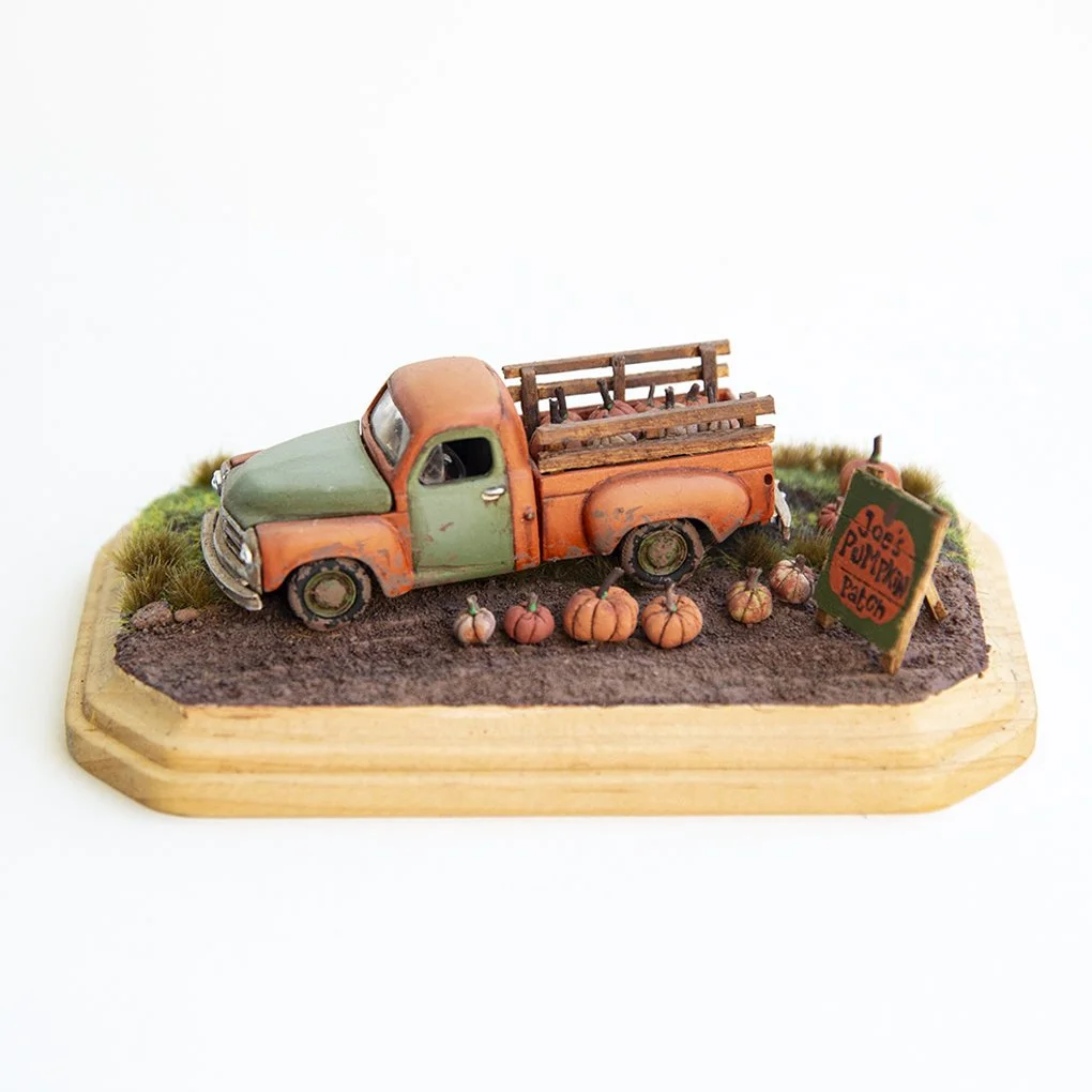 Miniature diecast vintage truck on custom diorama base. 