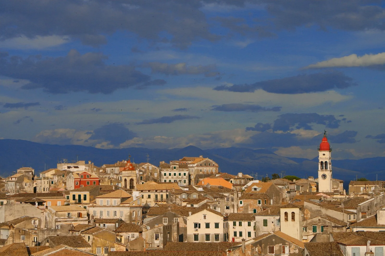 View of Corfu's Old City in Greece, saturated colors with old buildings and beautiful blue sky. 