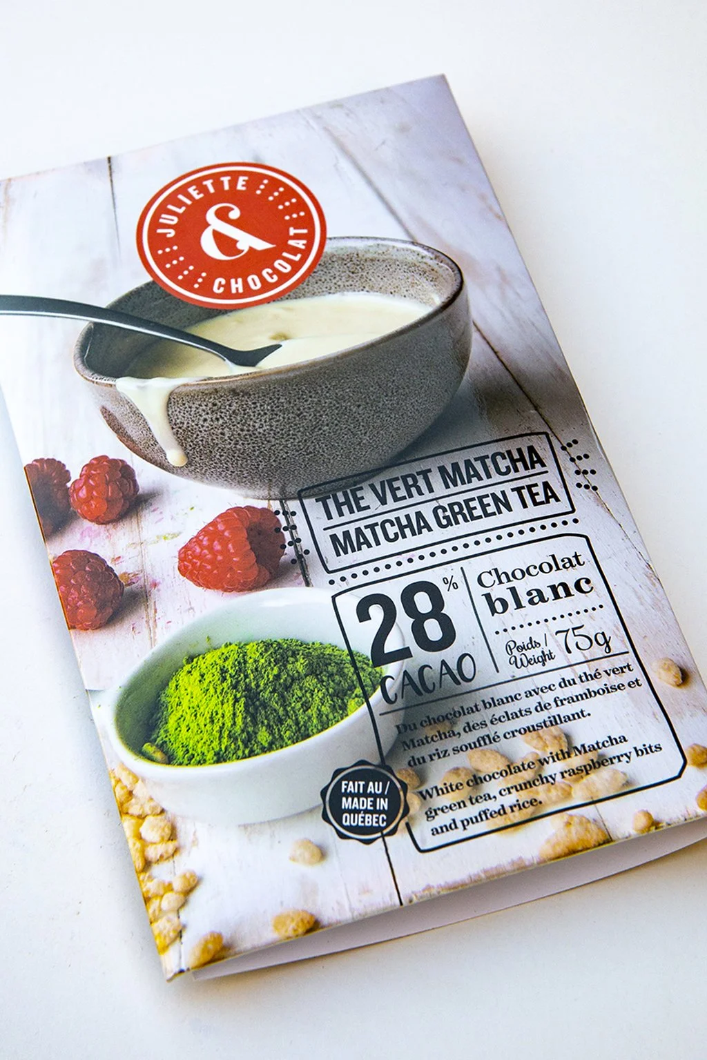 White chocolate and matcha bar with raspberries, chocolate bar packaging