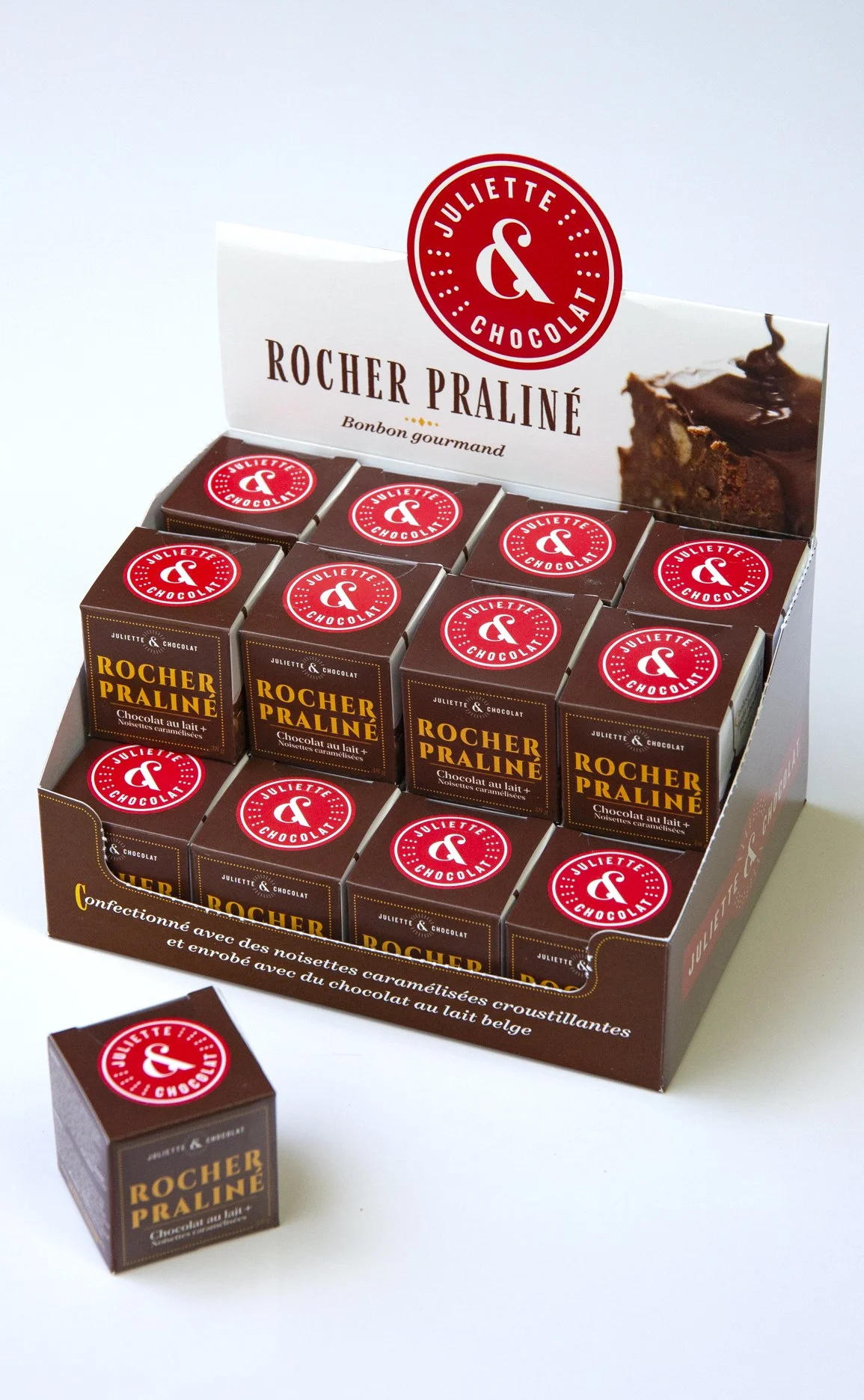 Juliette & Chocolat counter display stand for chocolate confections, with red logo