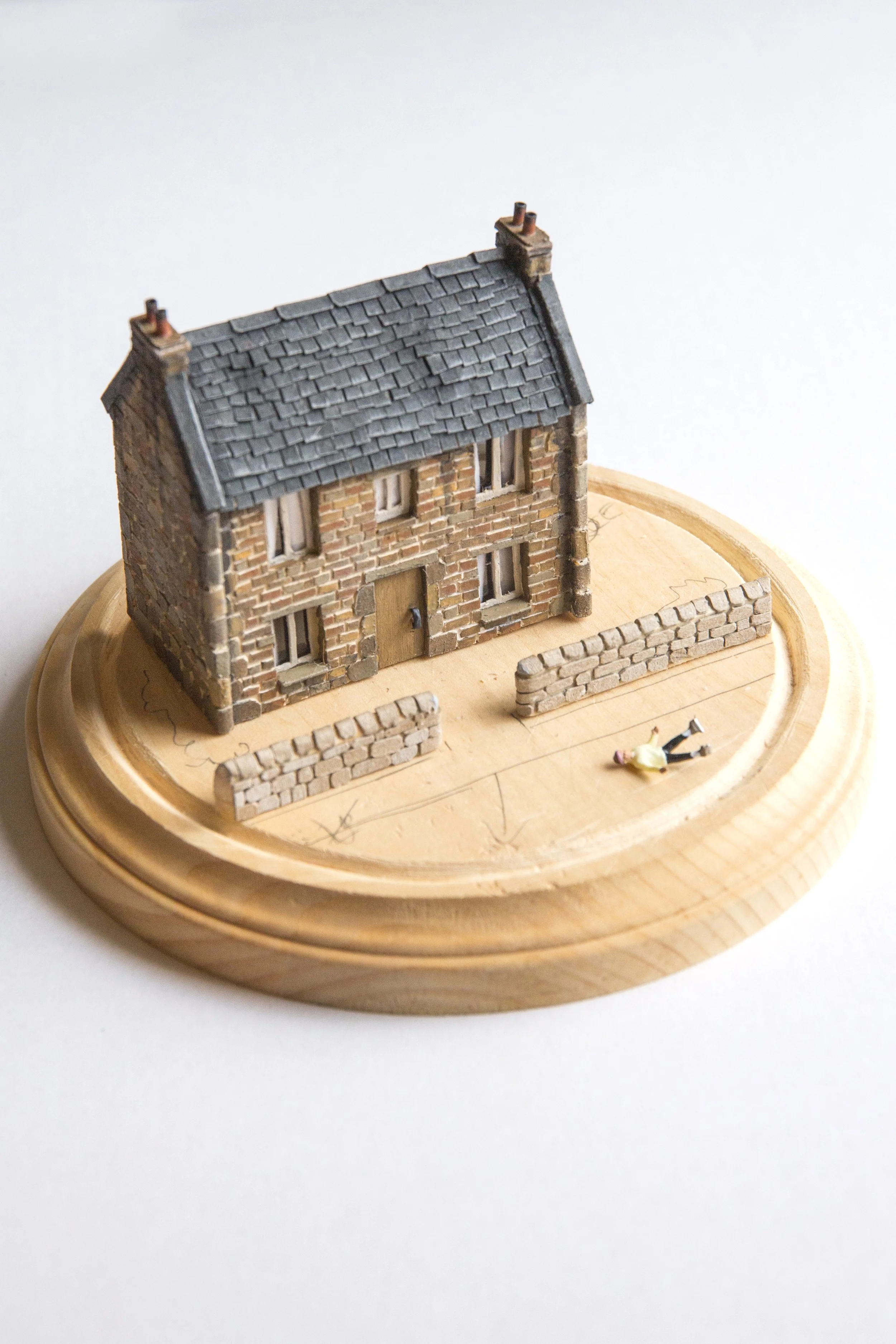 Tiny craft house, painted miniature on custom wooden base. 