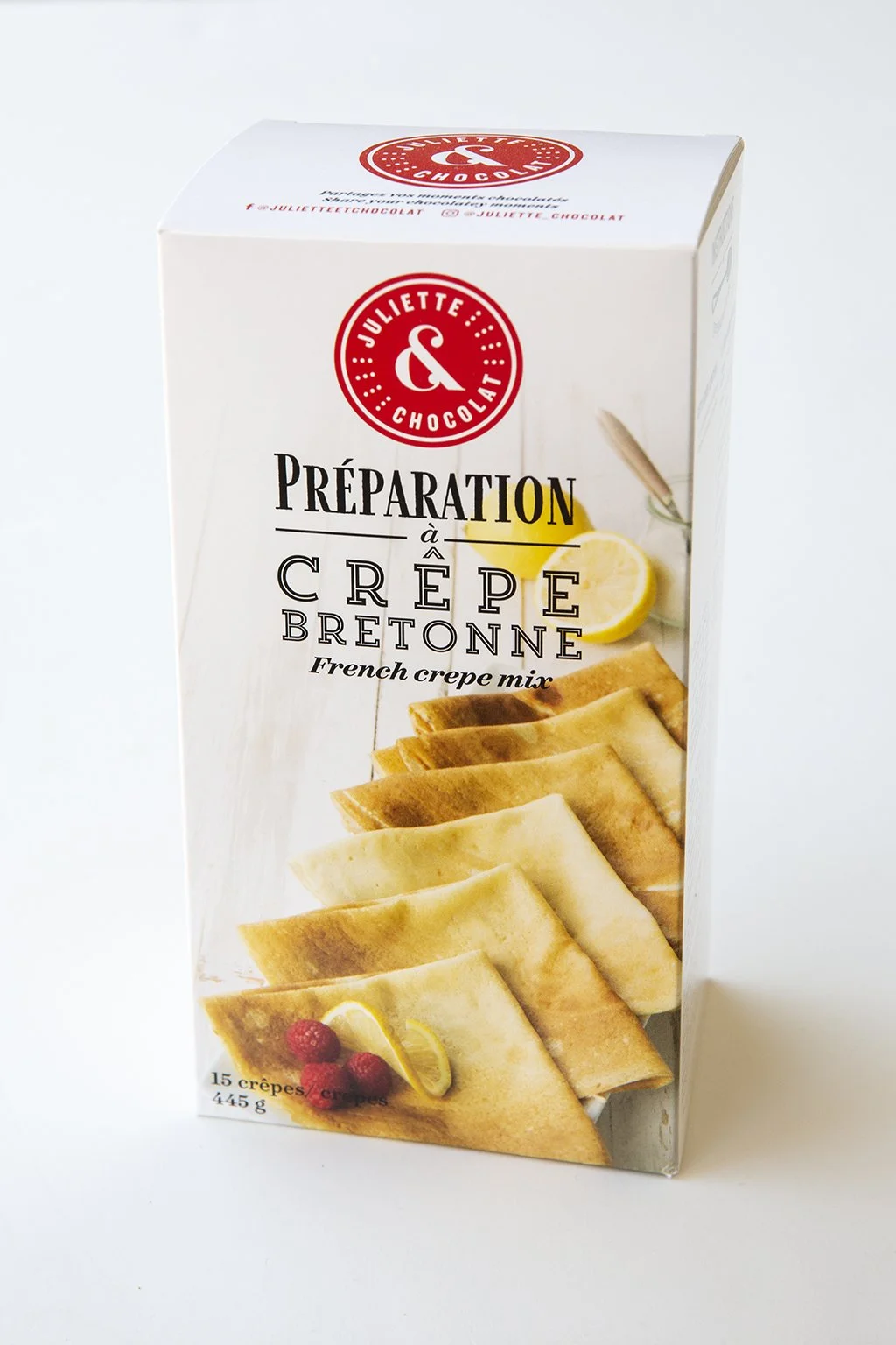 Packaging for cook at home mix to make French crepes, with folded crepes pictured on the box. 