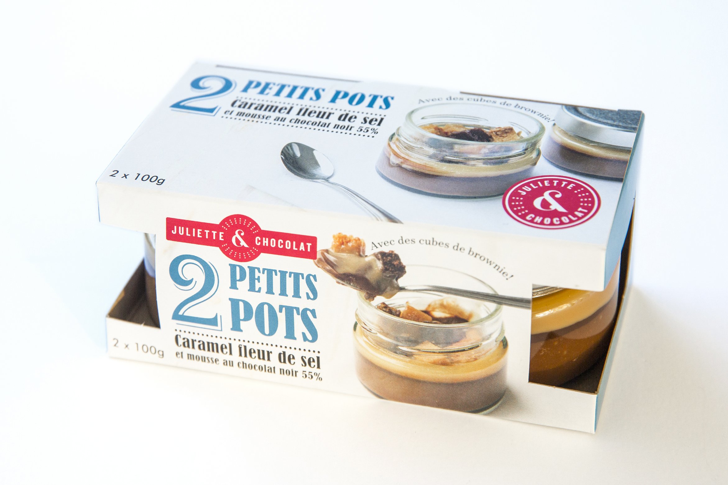Two pastries in a jar in retail packaging with a photo showing the interior