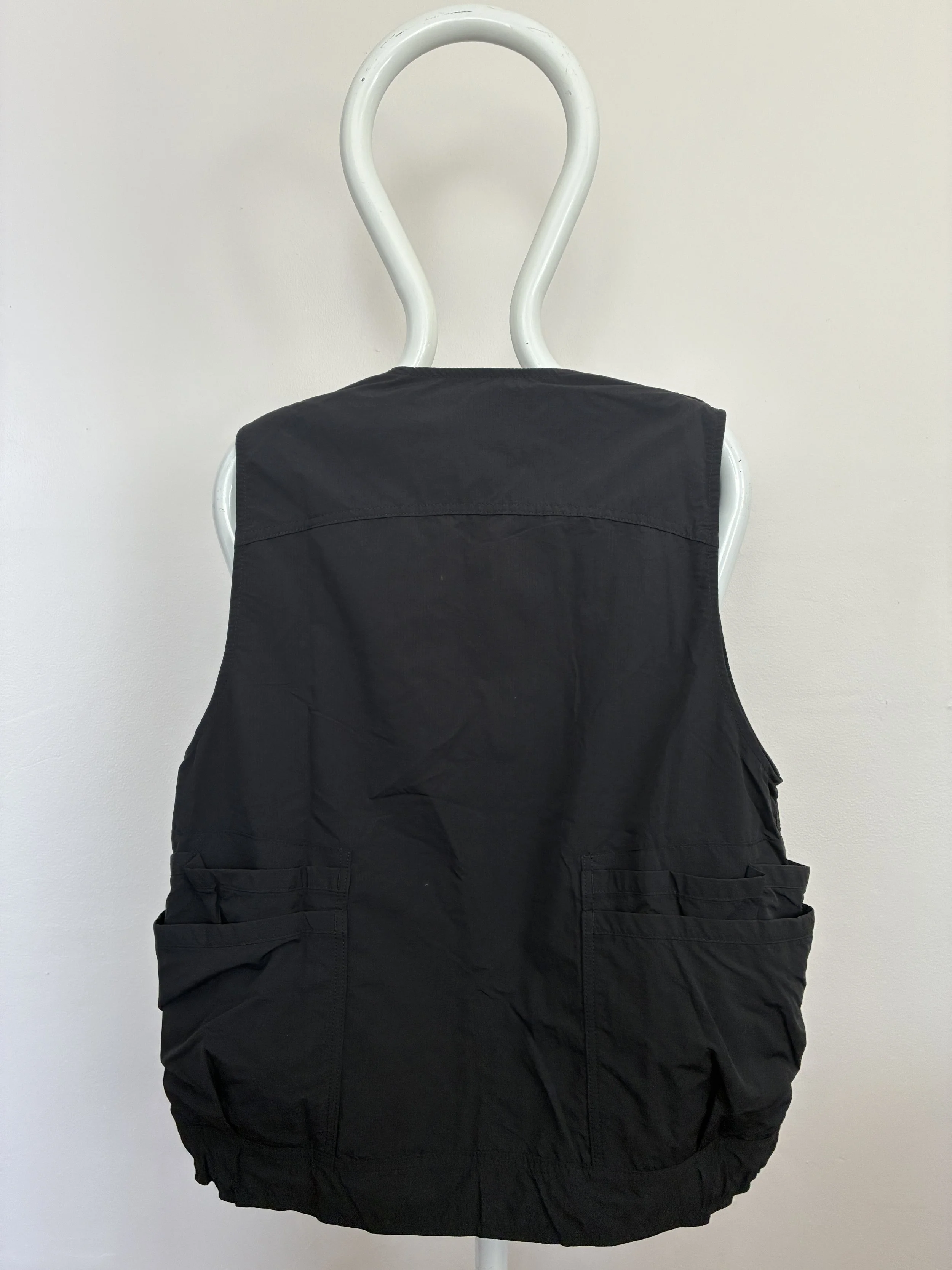 Back of Black Sassafras Overgrown Hiker Vest on mannequin