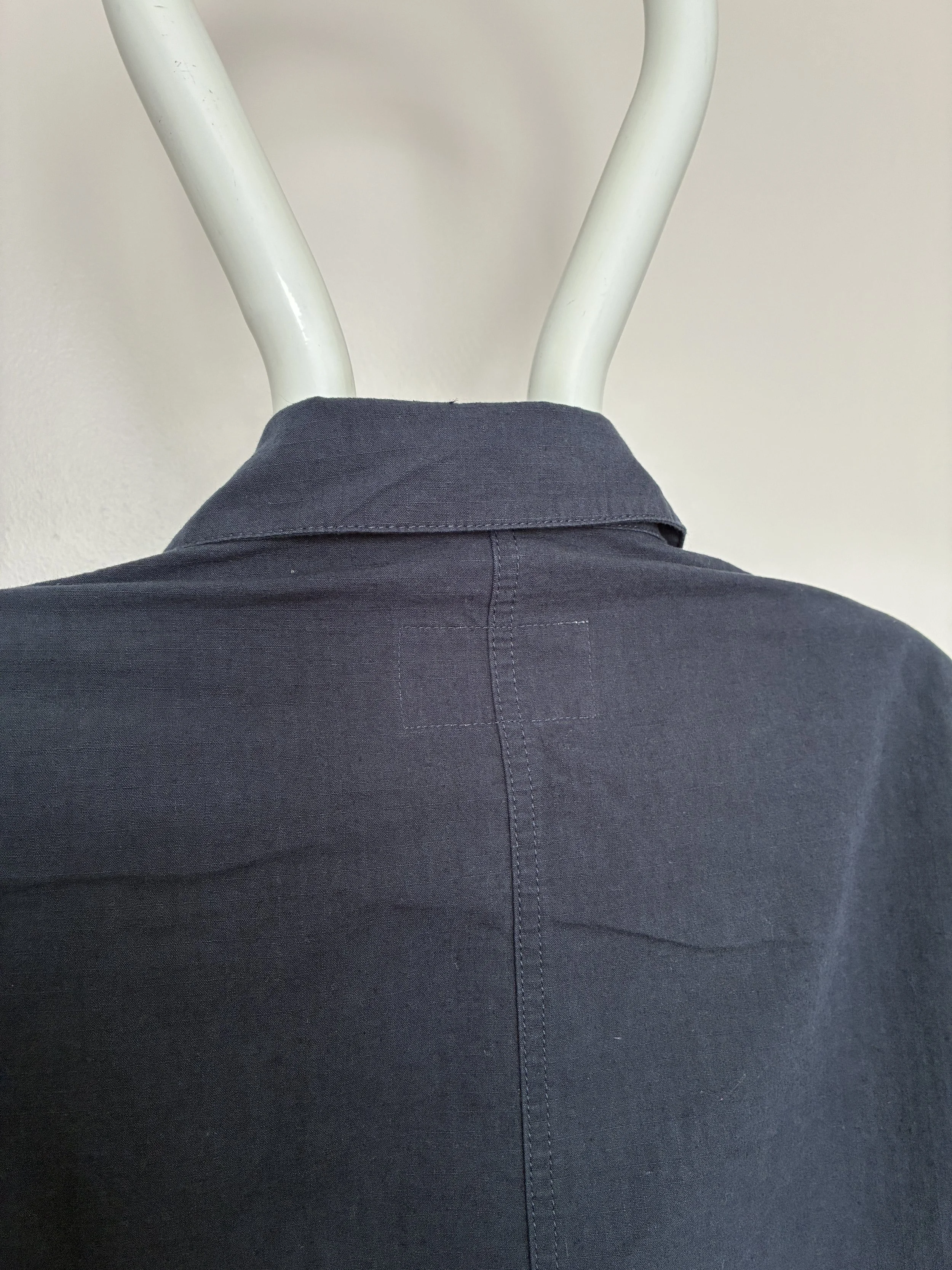 Closeup of back of 1st PAT-RN Navy Camden Jacket on mannequin