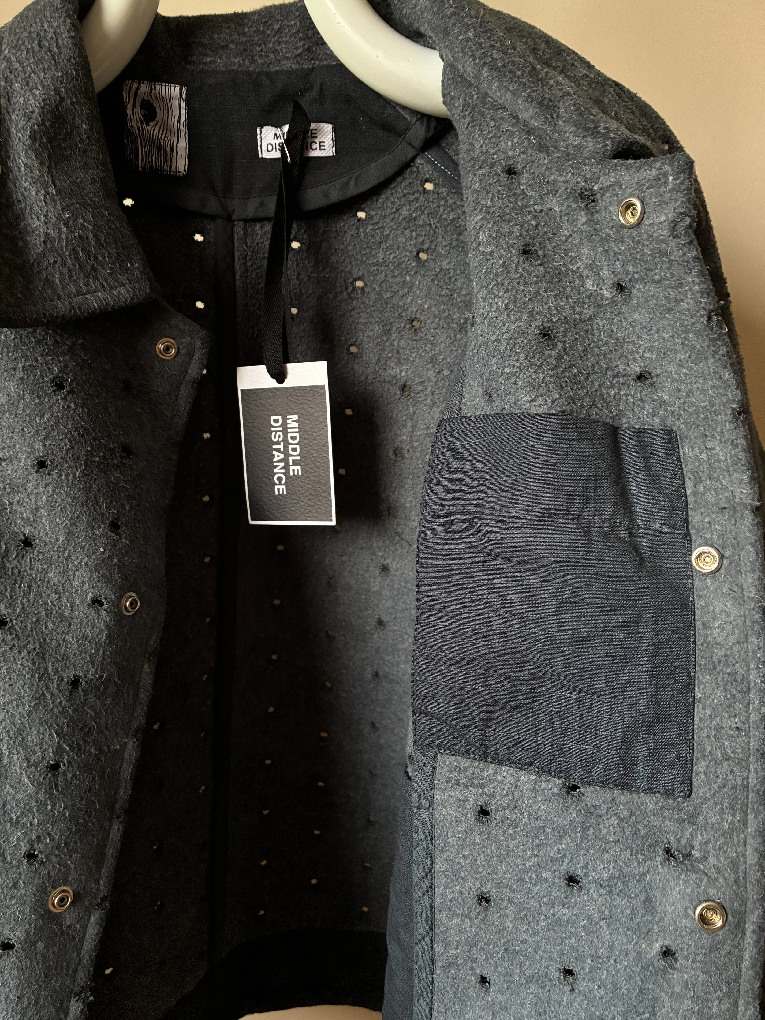 Closeup of inside pocket of Middle Distance grey Drill jacket