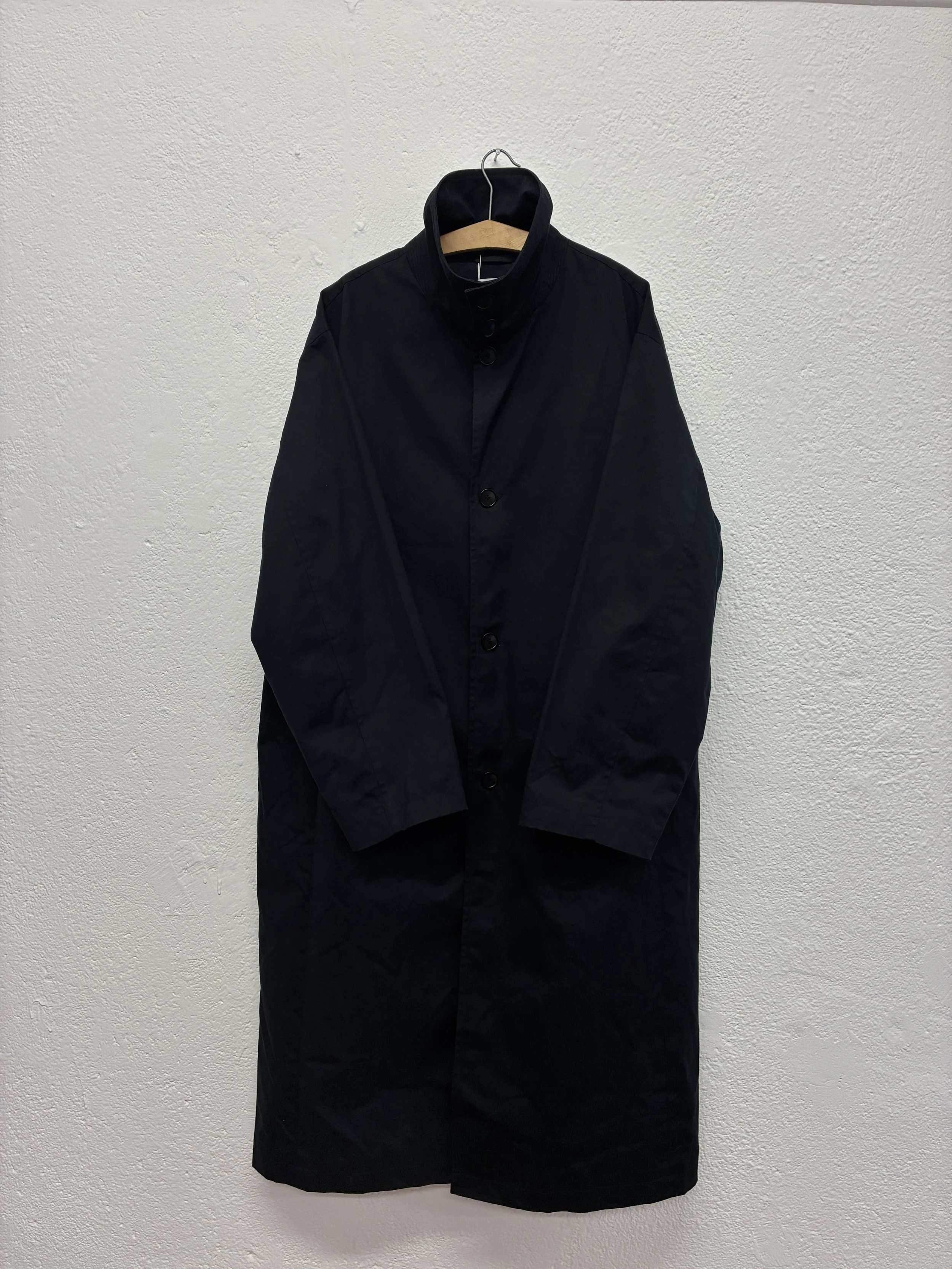 Navy De Dam Foundation Cotton Gabardine Trench Coat on hanger