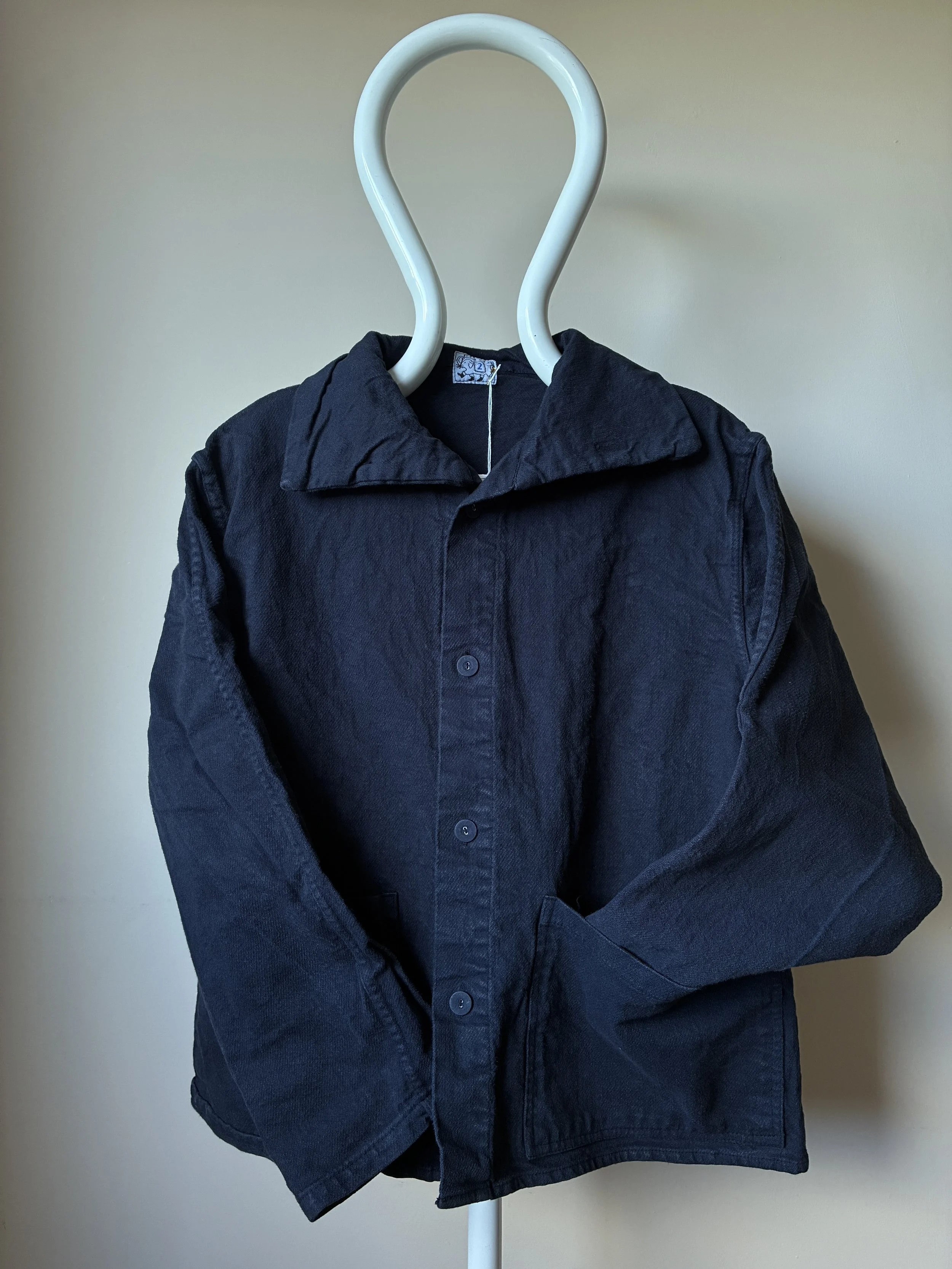 Hadal Blue Tender Co 931 Scout Jacket on mannequin with collar open