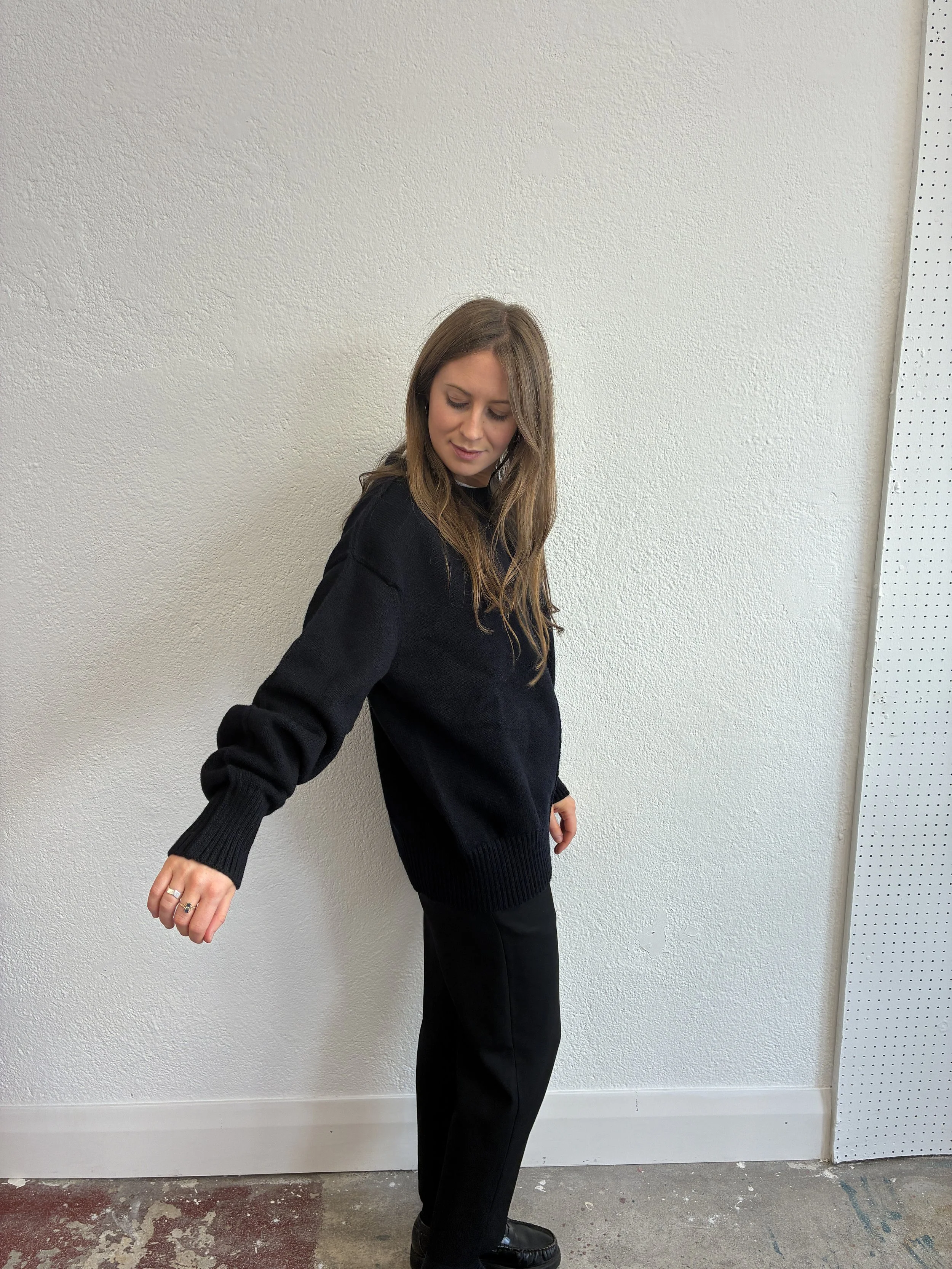 Side of Woman wearing the Navy Tender Co Type 719 Butterfly Jumper