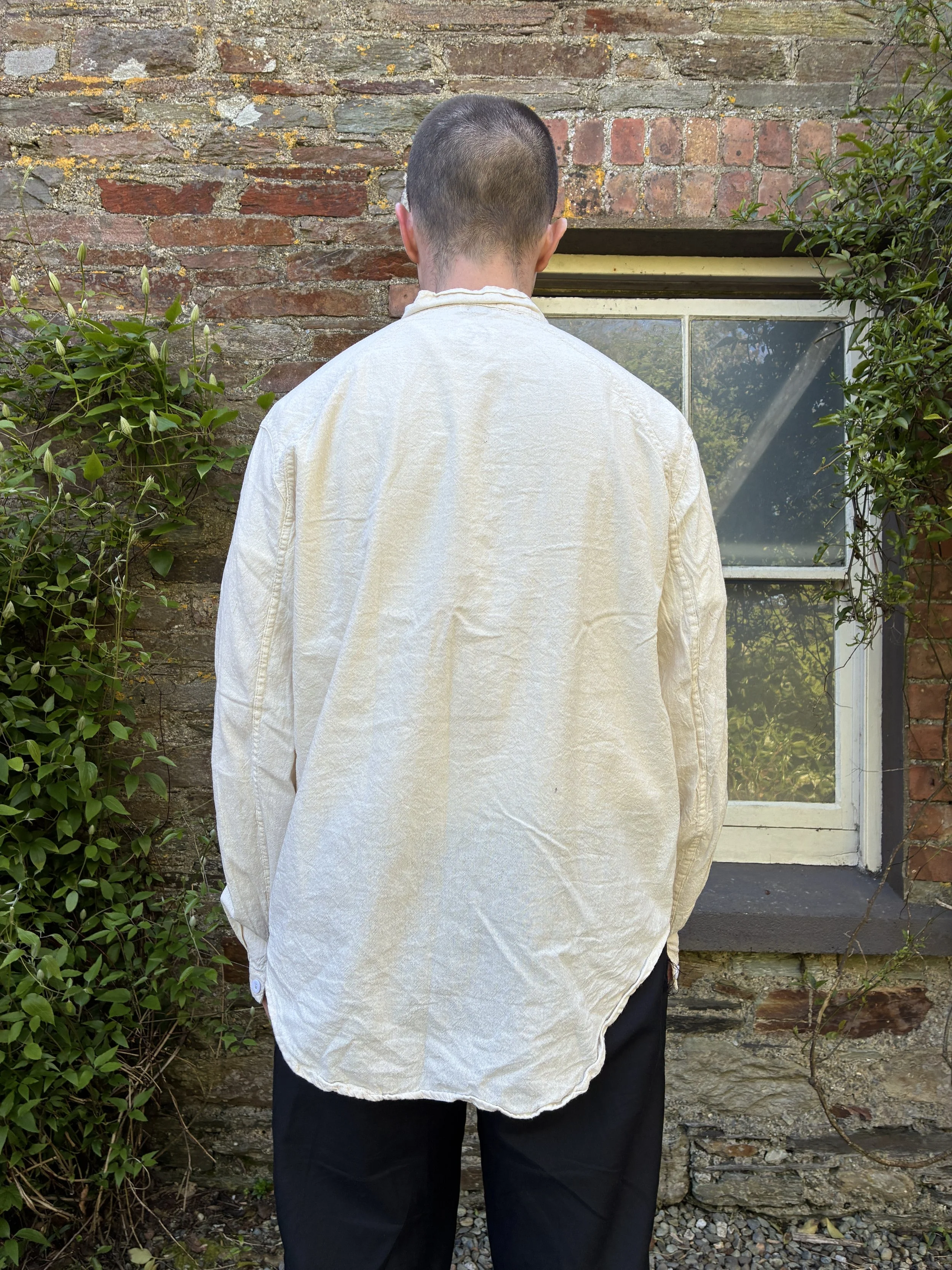Man modelling the back of the rinsed Tender Co Type 457 Frock Shirt