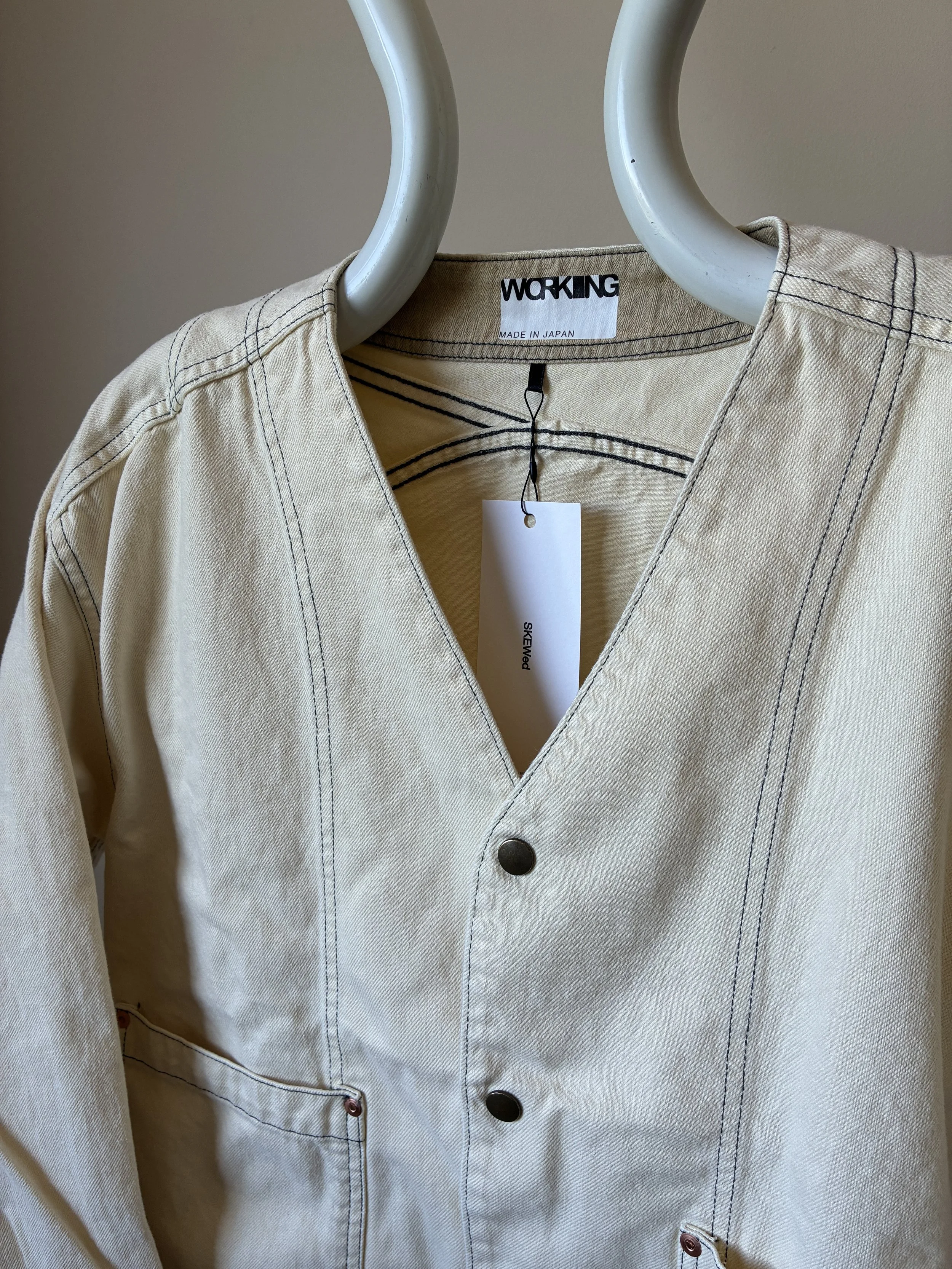 Front of Working Skewed yeast jacket on mannequin