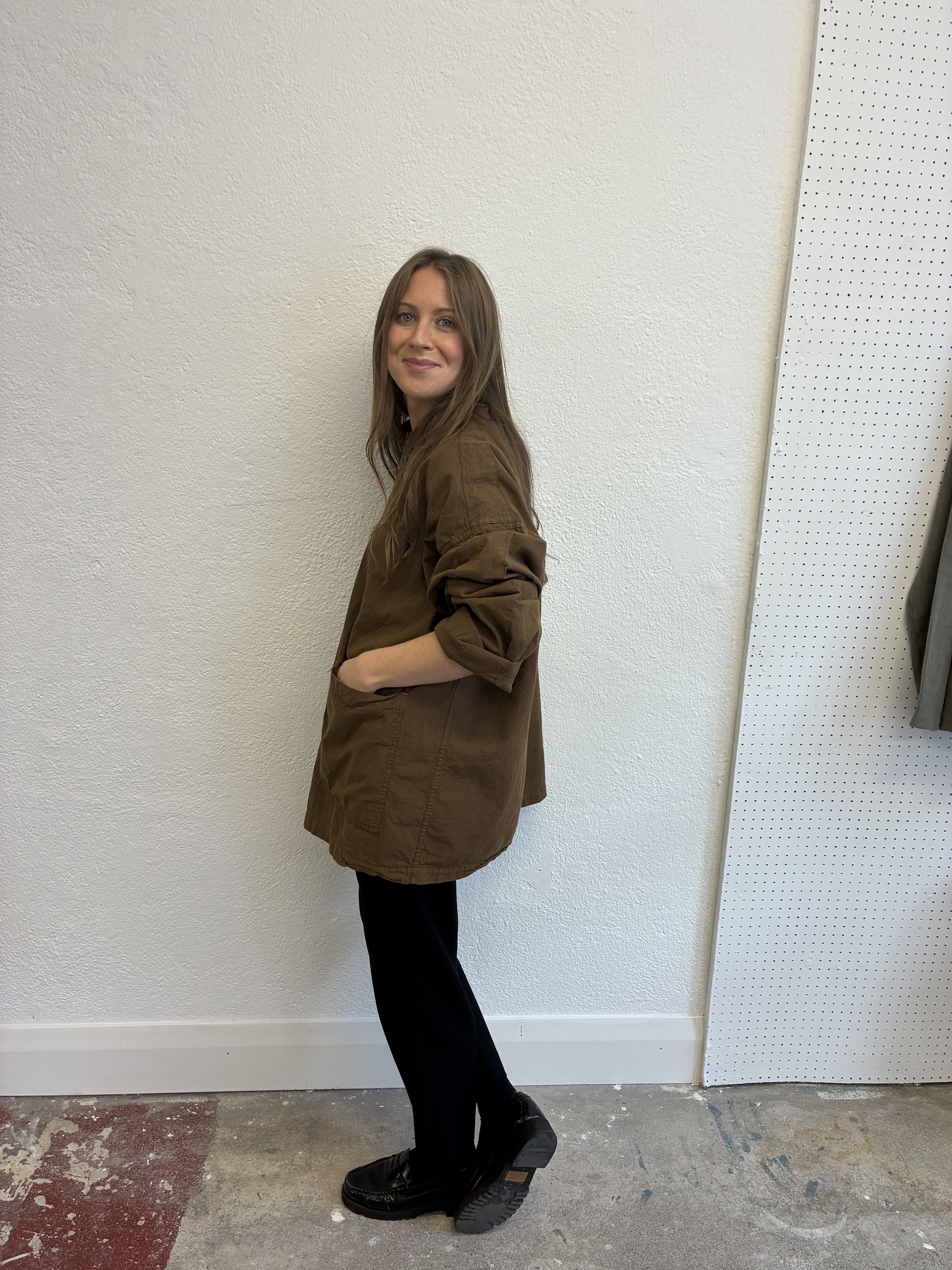 Side of woman wearing Tender Co Type 485 Isosceles Brown Hat Shirt