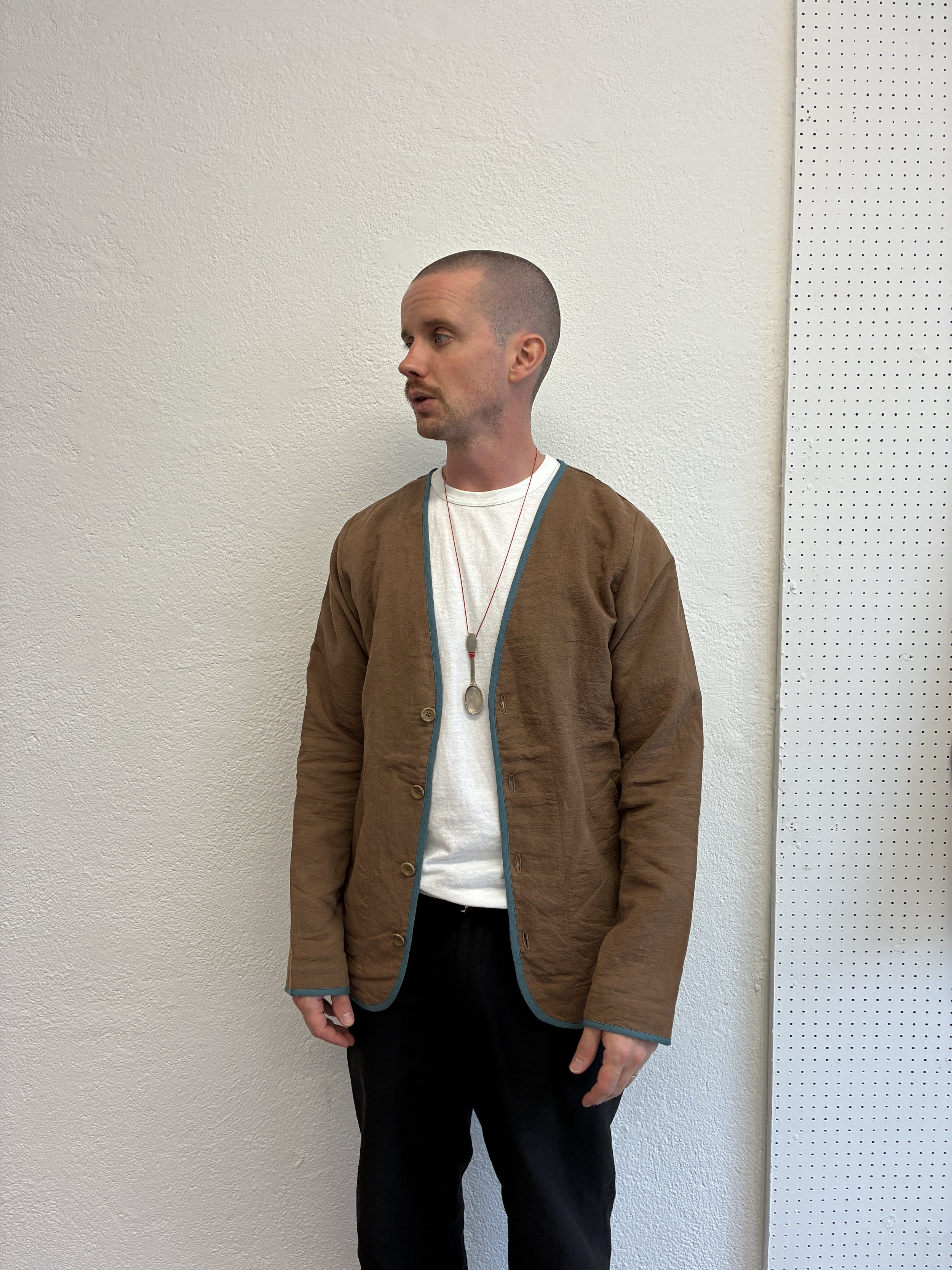 Man wearing Brown Teal Frank Leder Linen Cotton Jacket over white t shirt