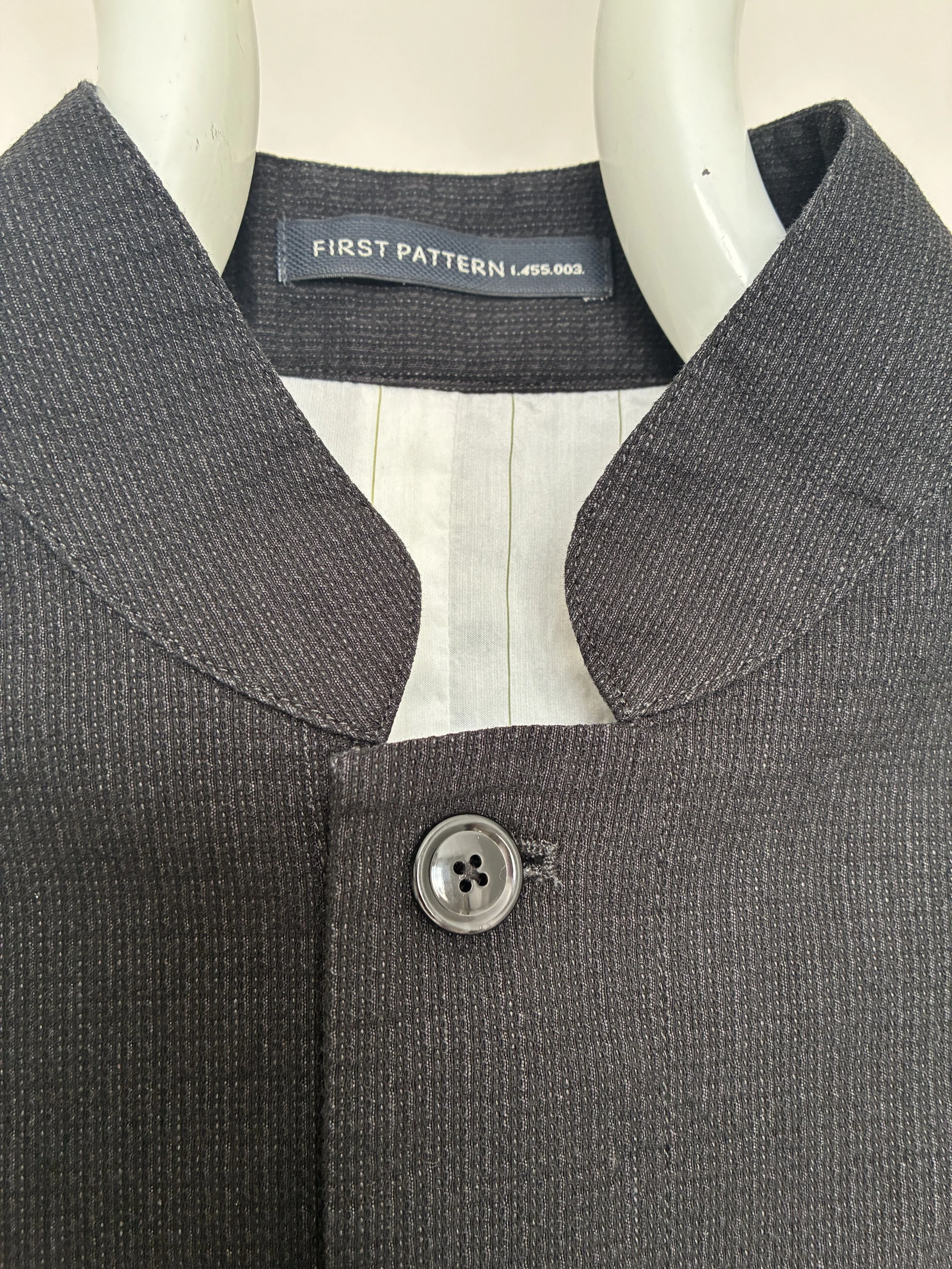 Closeup of collar of Charcoal 1st PAT-RN Woman Rei Jacket on mannequin