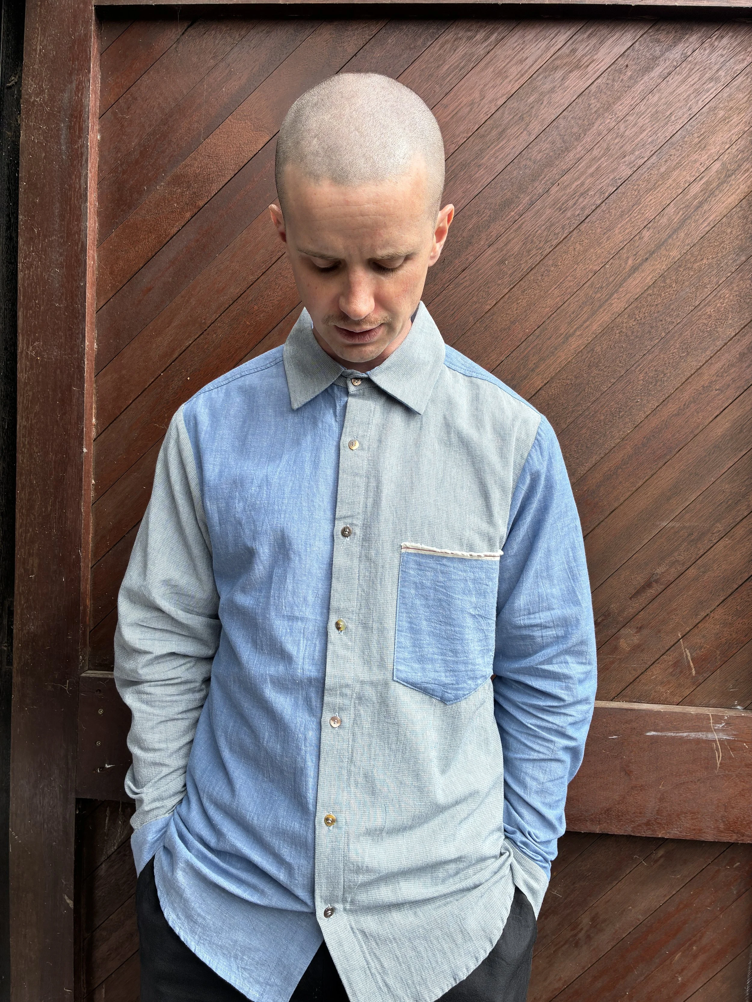 Man in front of door wearing Frank Leder Blue Patchwork Vintage Fabric Edition Shirt