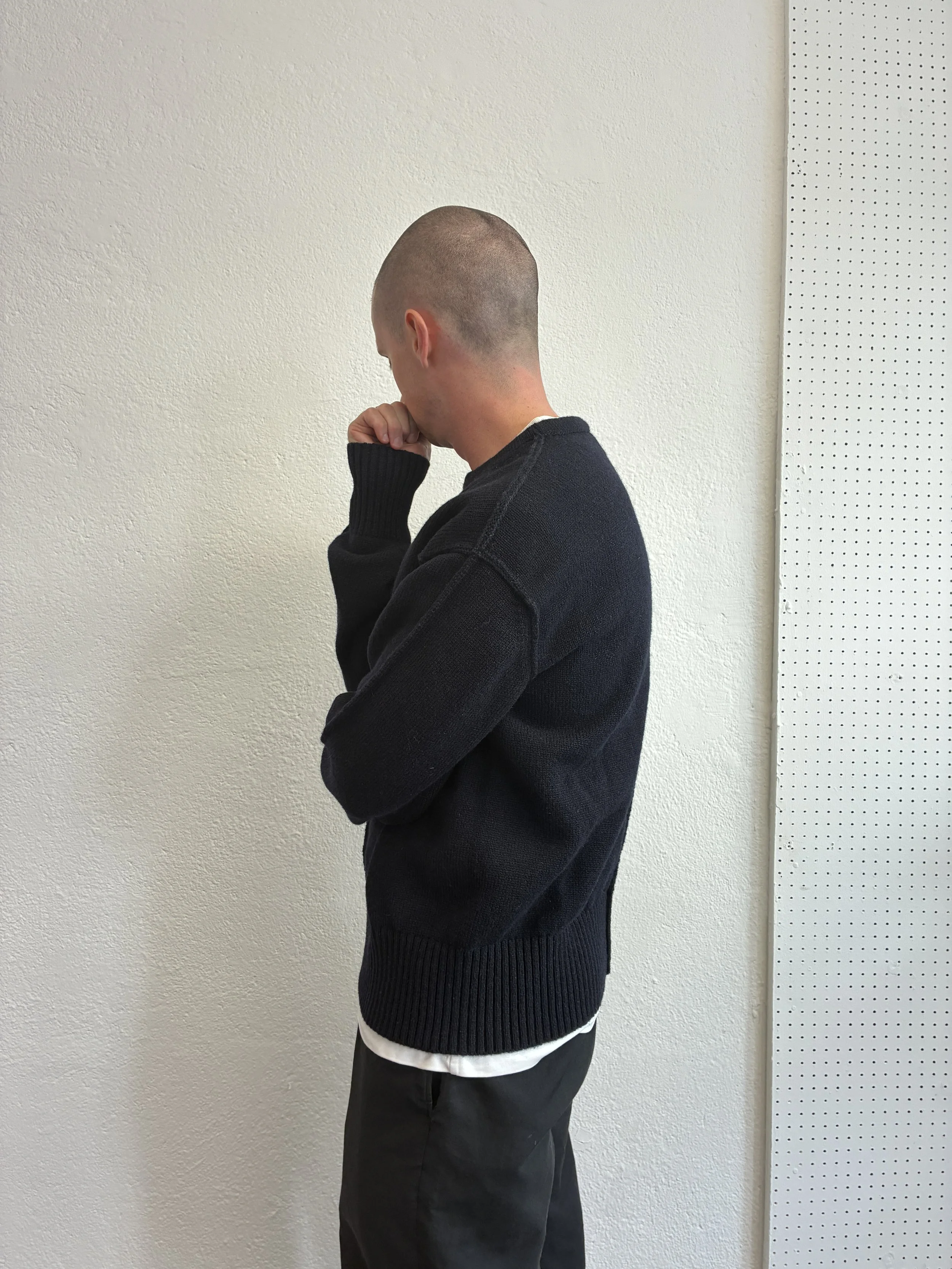 Man thinking in the Navy Tender Co Type 719 Butterfly Jumper