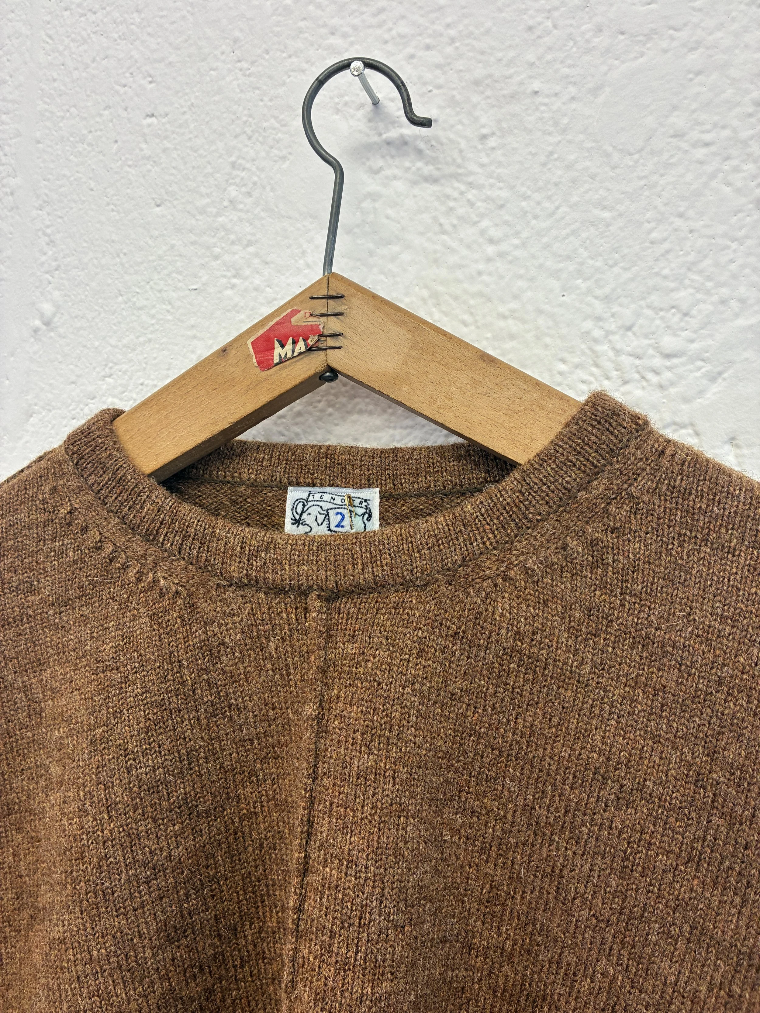 Closeup of collar of Brown Tender Co Type 719 Butterfly Jumper on hanger