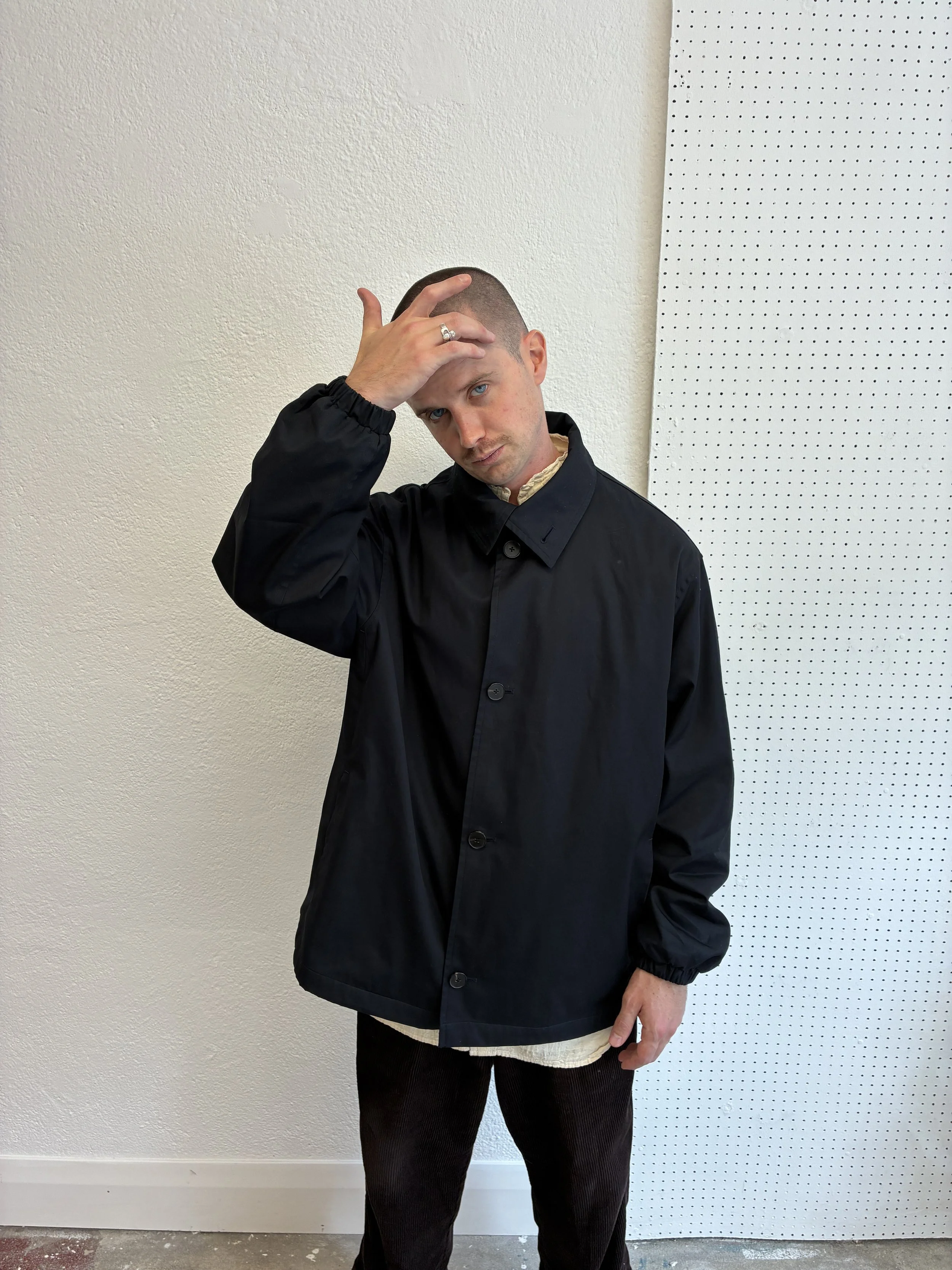 Man wearing Navy De Dam Foundation Cotton Gabardine Jacket