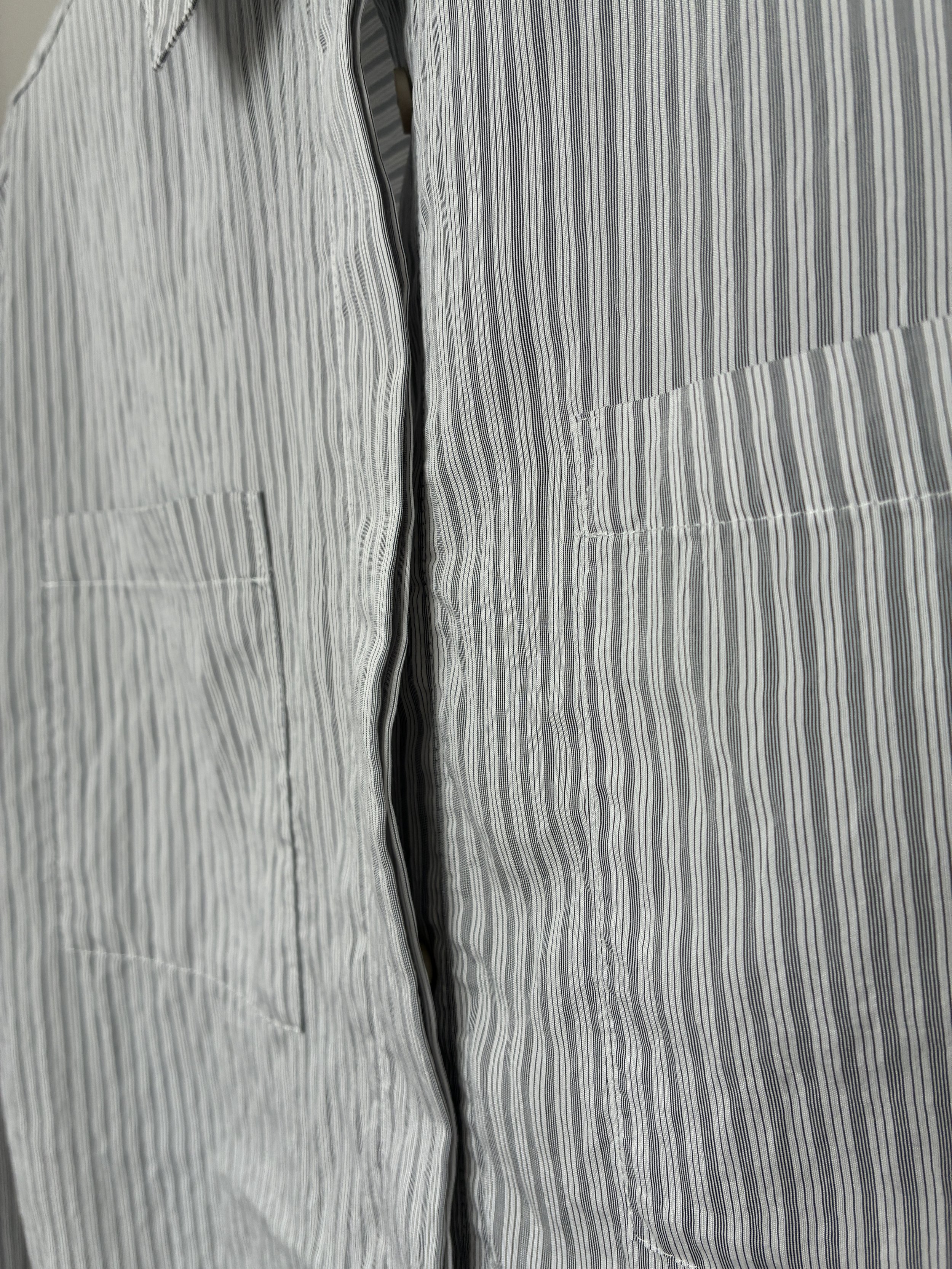 Closeup of buttons and pockets of 1st PAT-RN Woman Modula Shirt in Fine Stripes