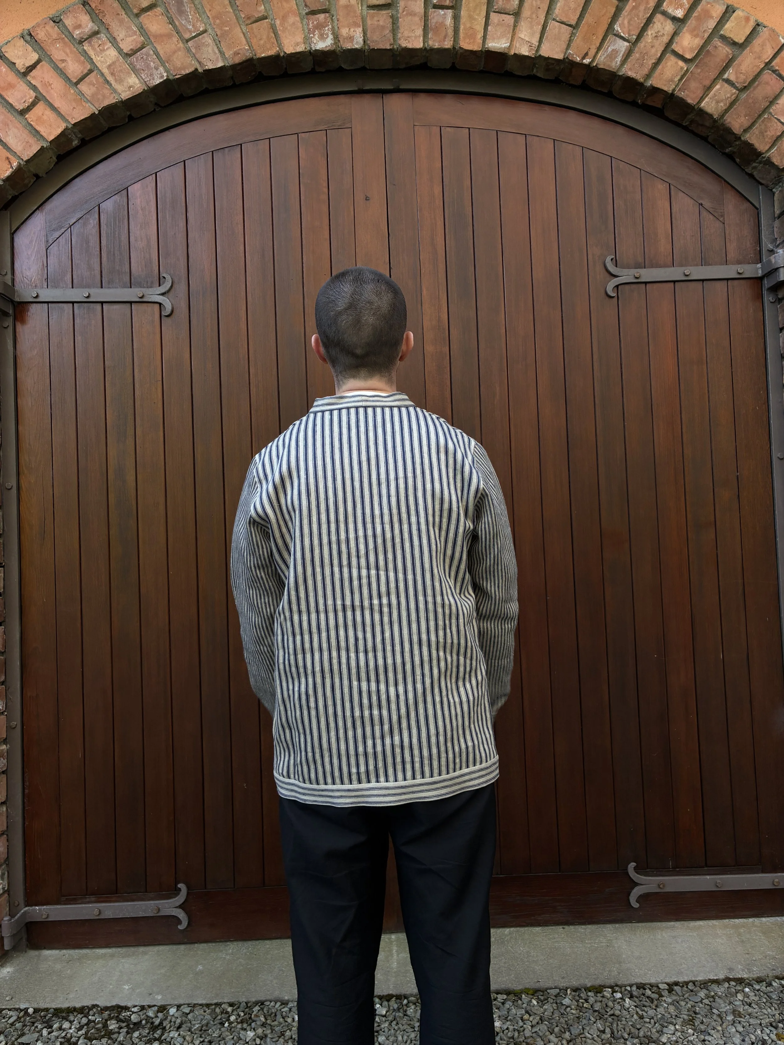 Back of man wearing Frank Leder Striped Linen Cardigan Jacket outside