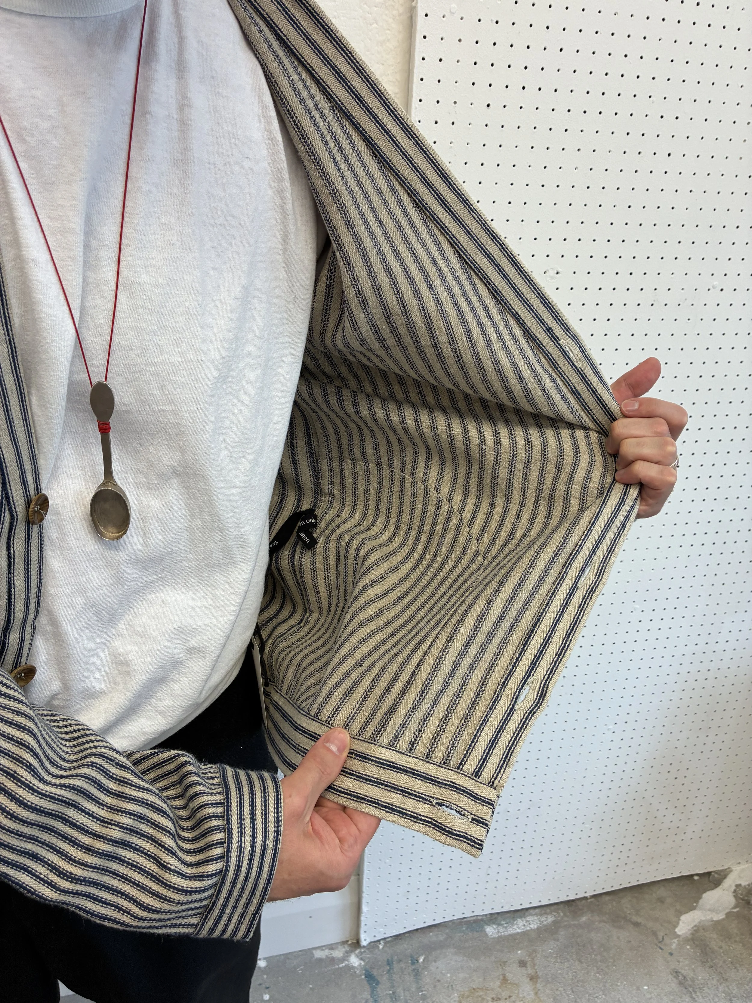 Man showing inside of Striped Frank Leder Linen Cardigan Jacket