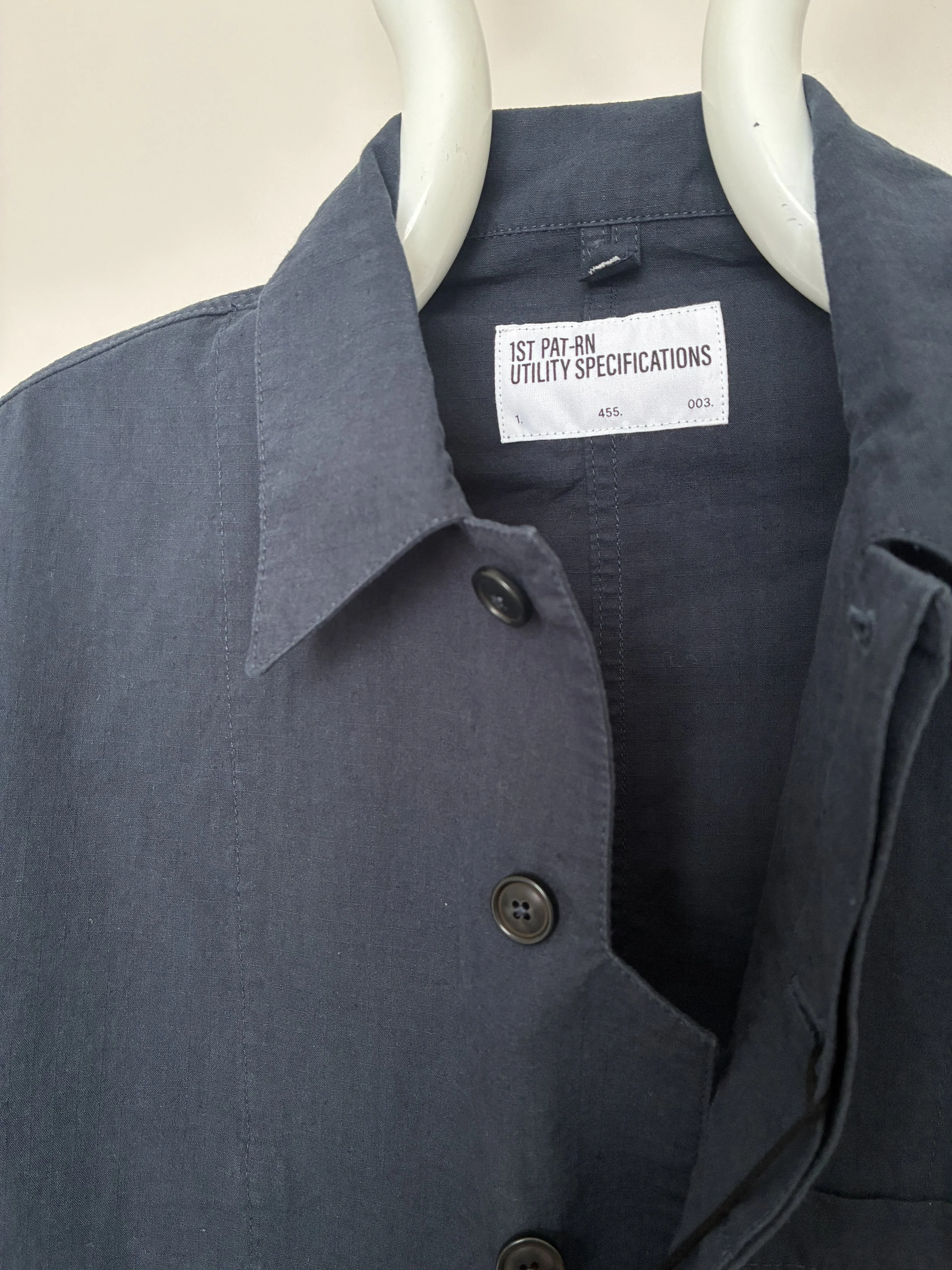 Closeup of detail of 1st PAT-RN Navy Camden Jacket on mannequin