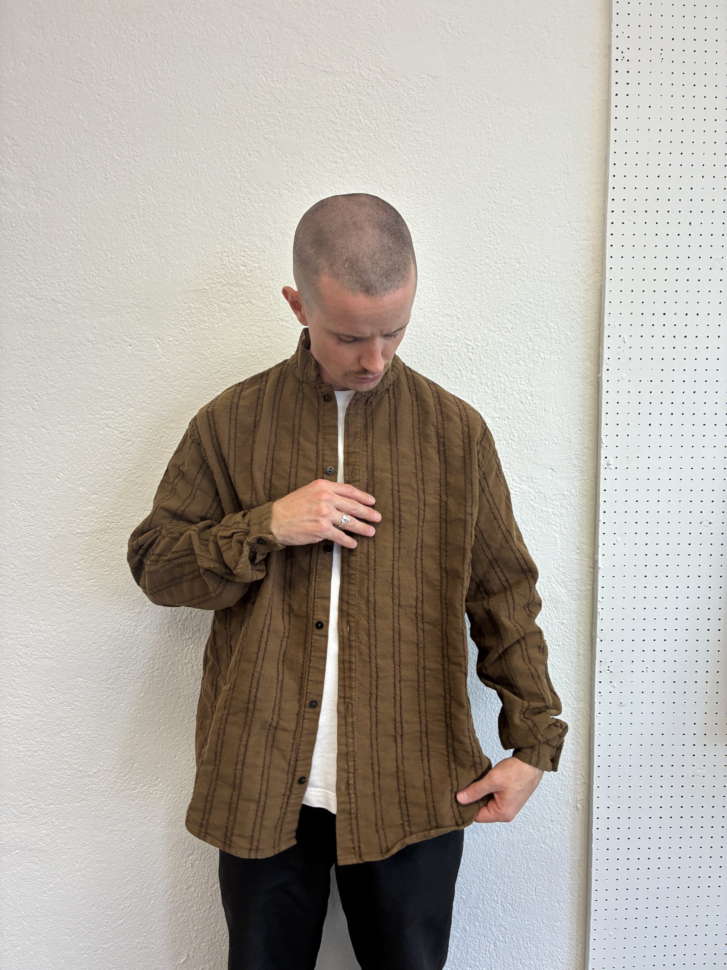 Man wearing Brown Tender Co Type 486 Burro Shirt over white tshirt