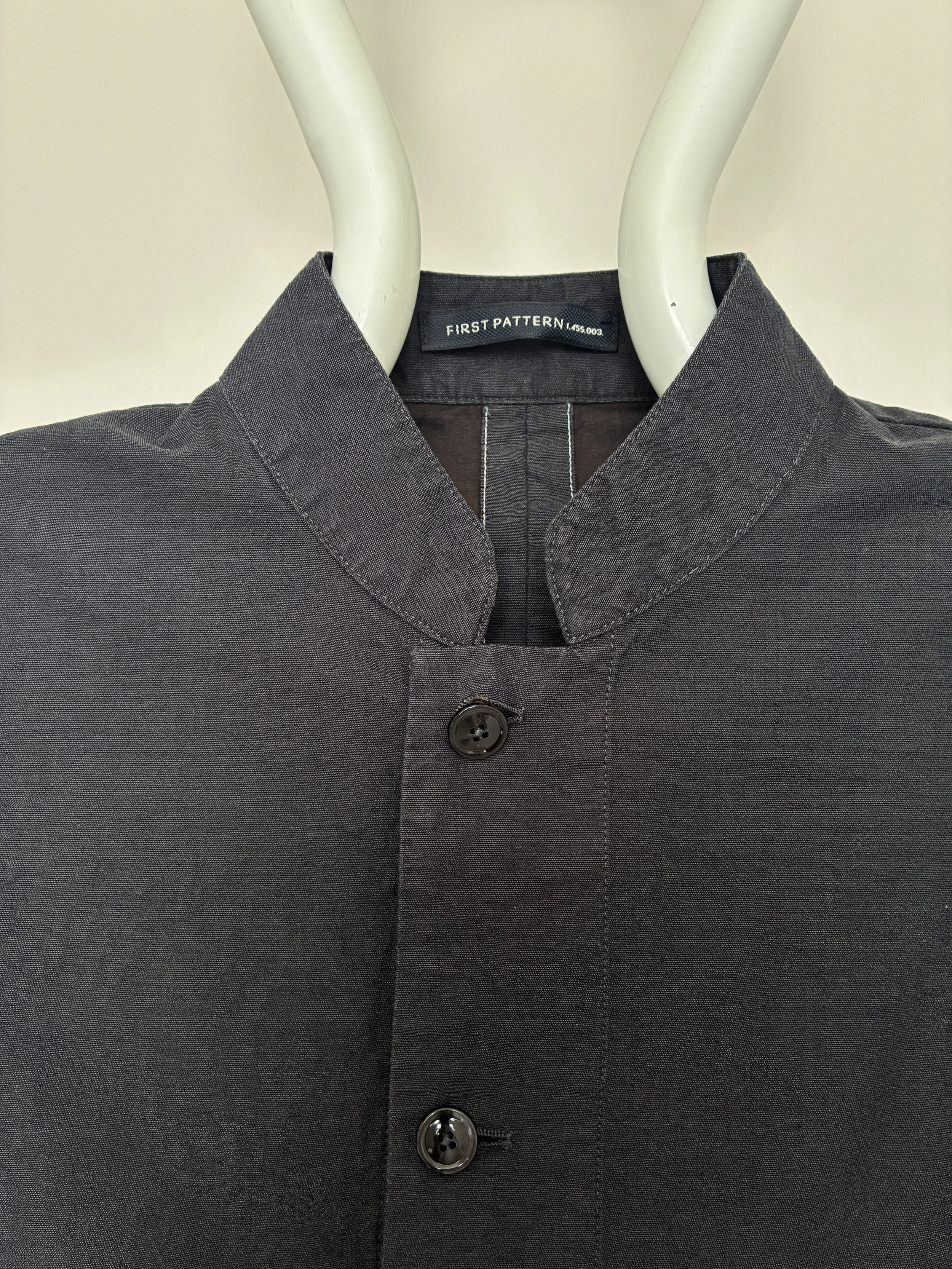 Collar closeup of Navy 1st PAT-RN Woman Rei Jacket on mannequin