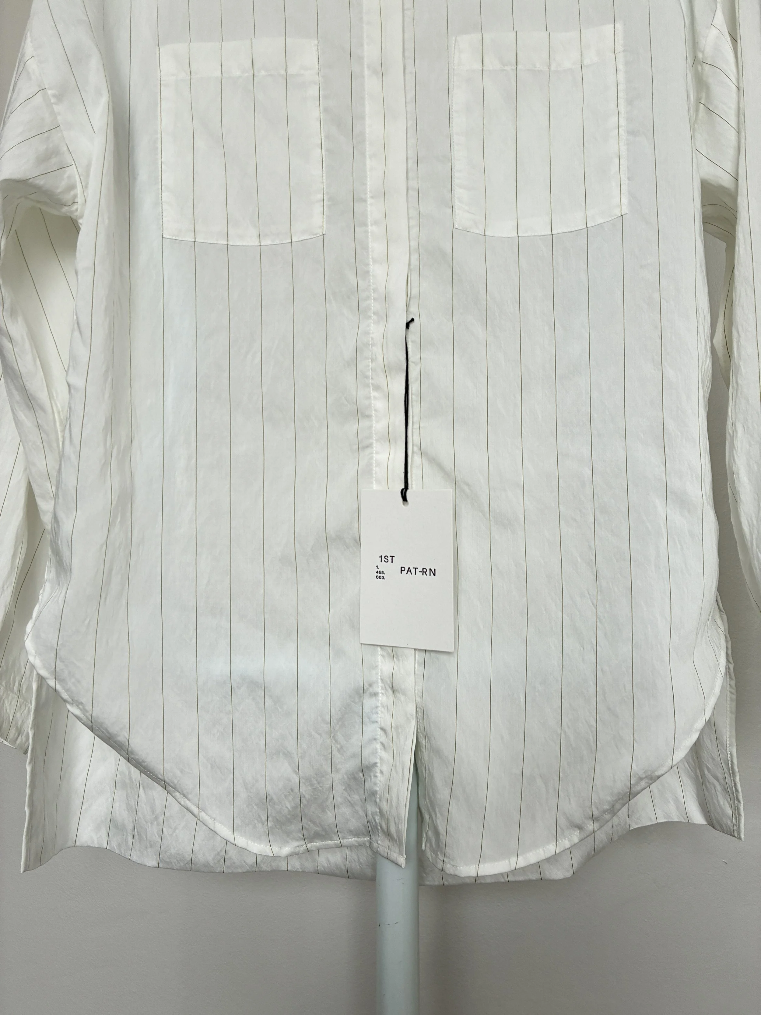 Bottom of 1st PAT-RN Woman Modula Shirt in Tailored Stripes on mannequin