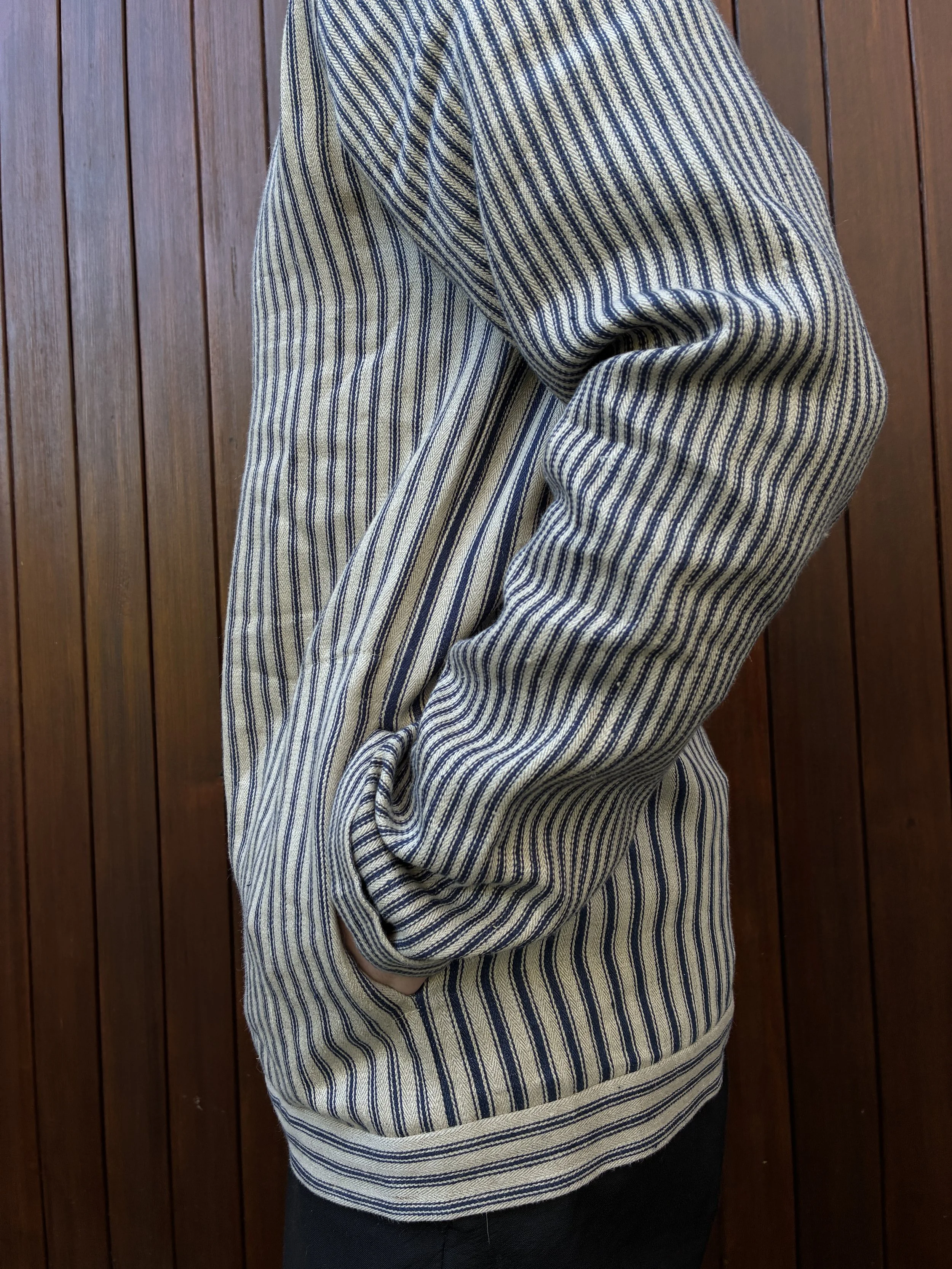 Close up of hands in pockets of Close up of Frank Leder Striped Linen Cardigan Jacket