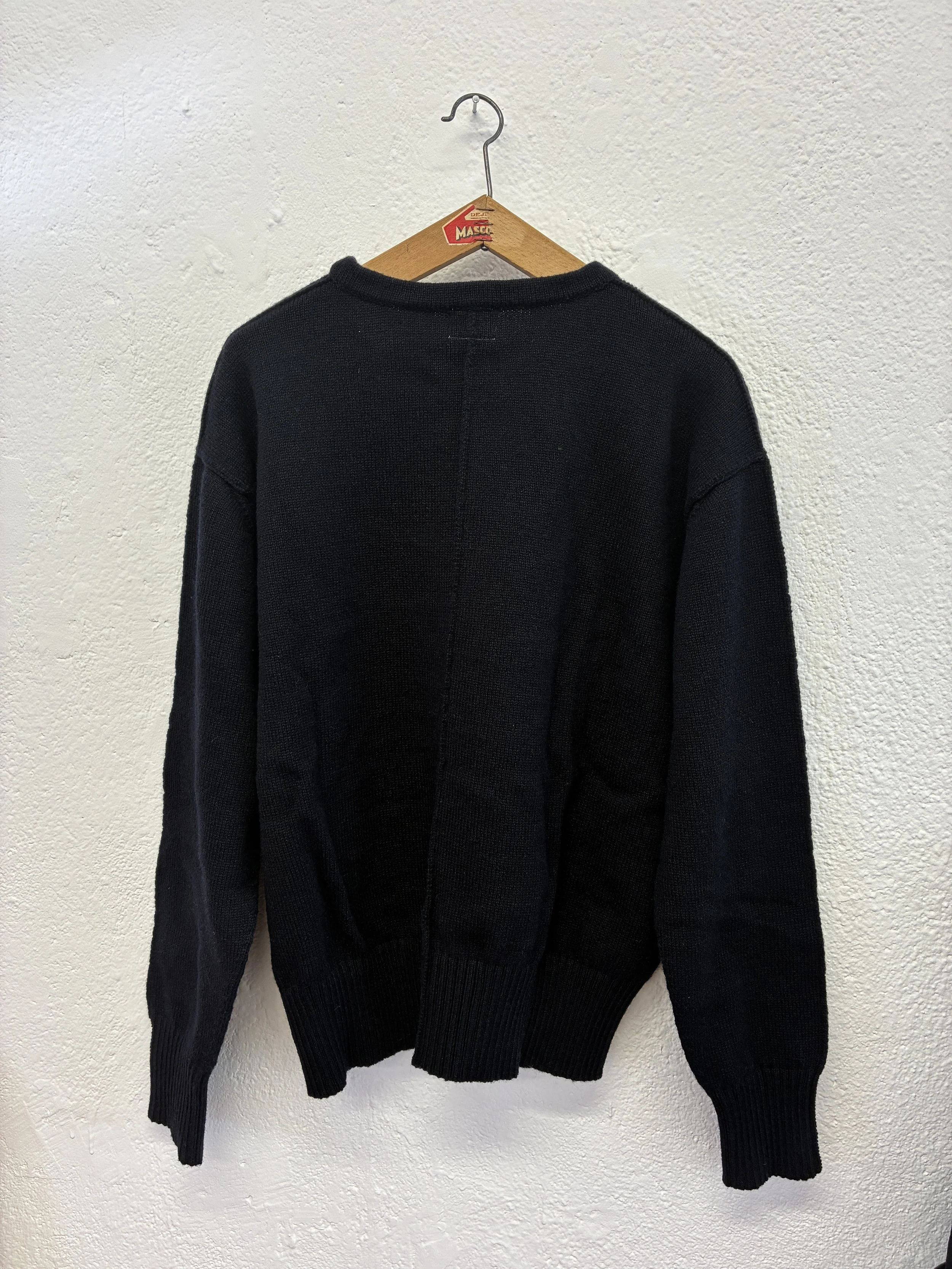 Back of Navy Tender Co Type 719 Butterfly Jumper on hanger