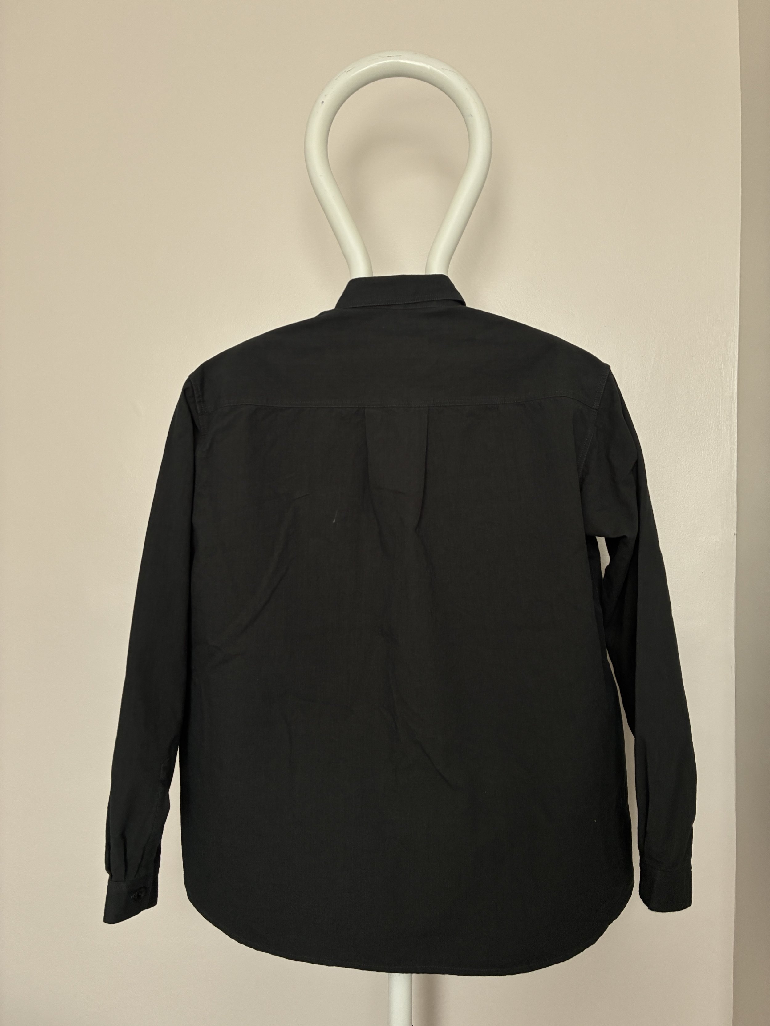 Back of 1st PAT-RN Sumatra Charcoal Overshirt on mannequin