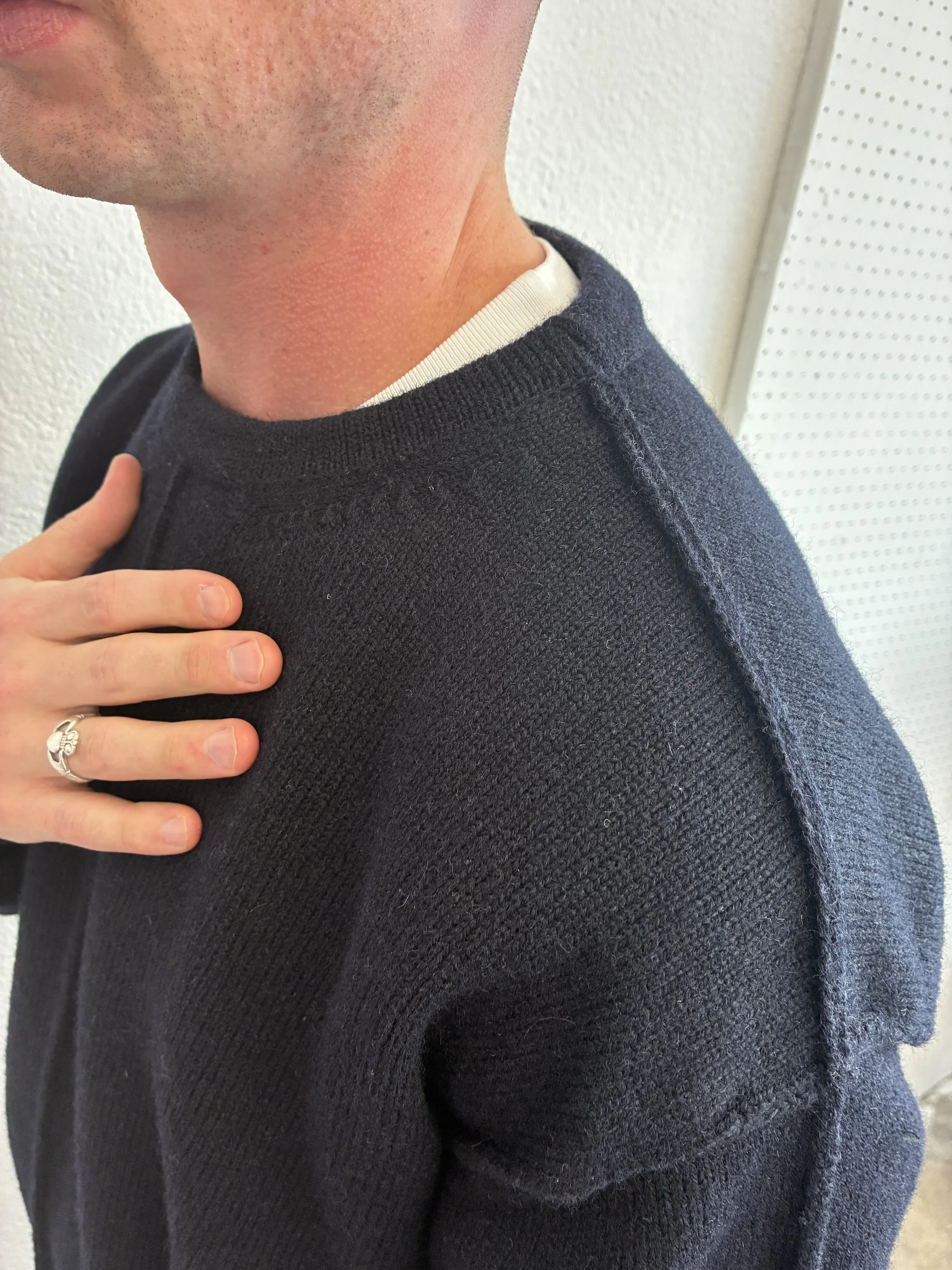 Closeup of collar on man wearing the Navy Tender Co Type 719 Butterfly Jumper